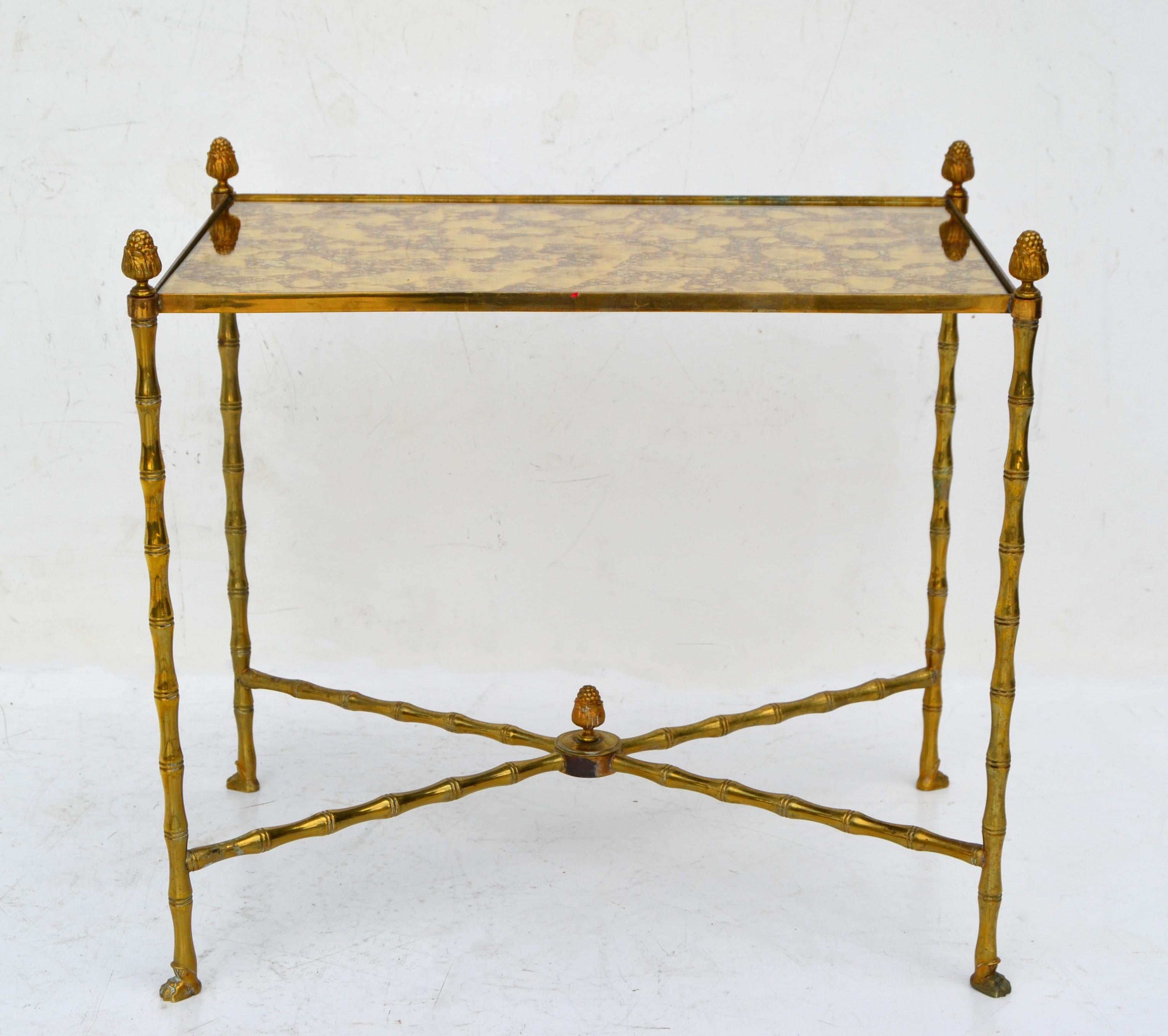Maison Bagués rectangular side table, end table, sofa table.
Faux bamboo bronze and brass decorative cross base with an antique gold cloudy mirror top.
 