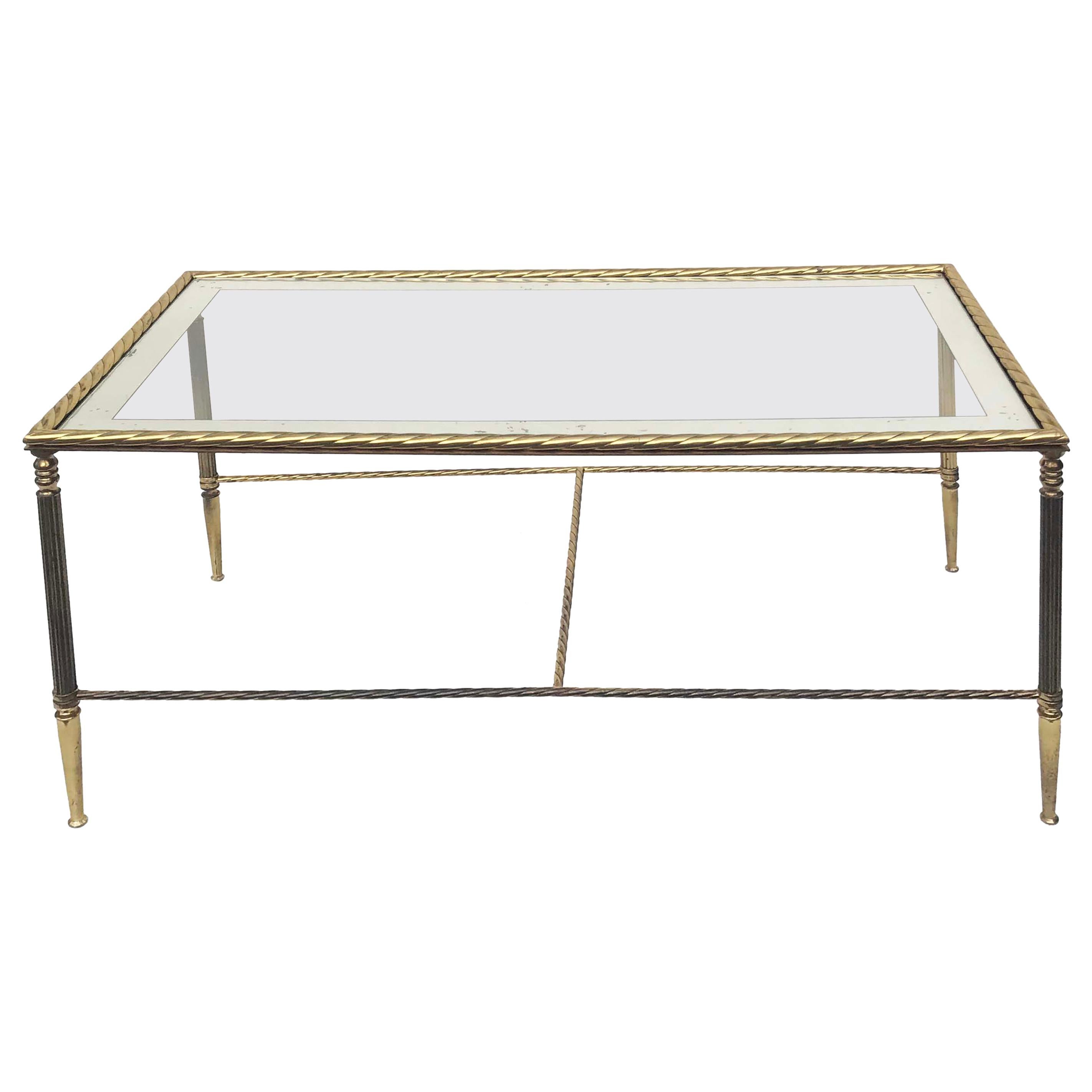 Superb Coffee table in the style of Maison Baguès, brass and mirror top.