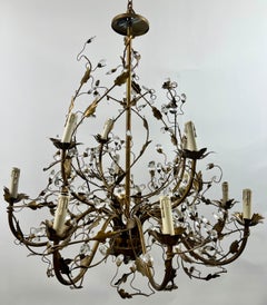 Lustre en métal bronzé de style Maison Bagues - 12 bras de lumière