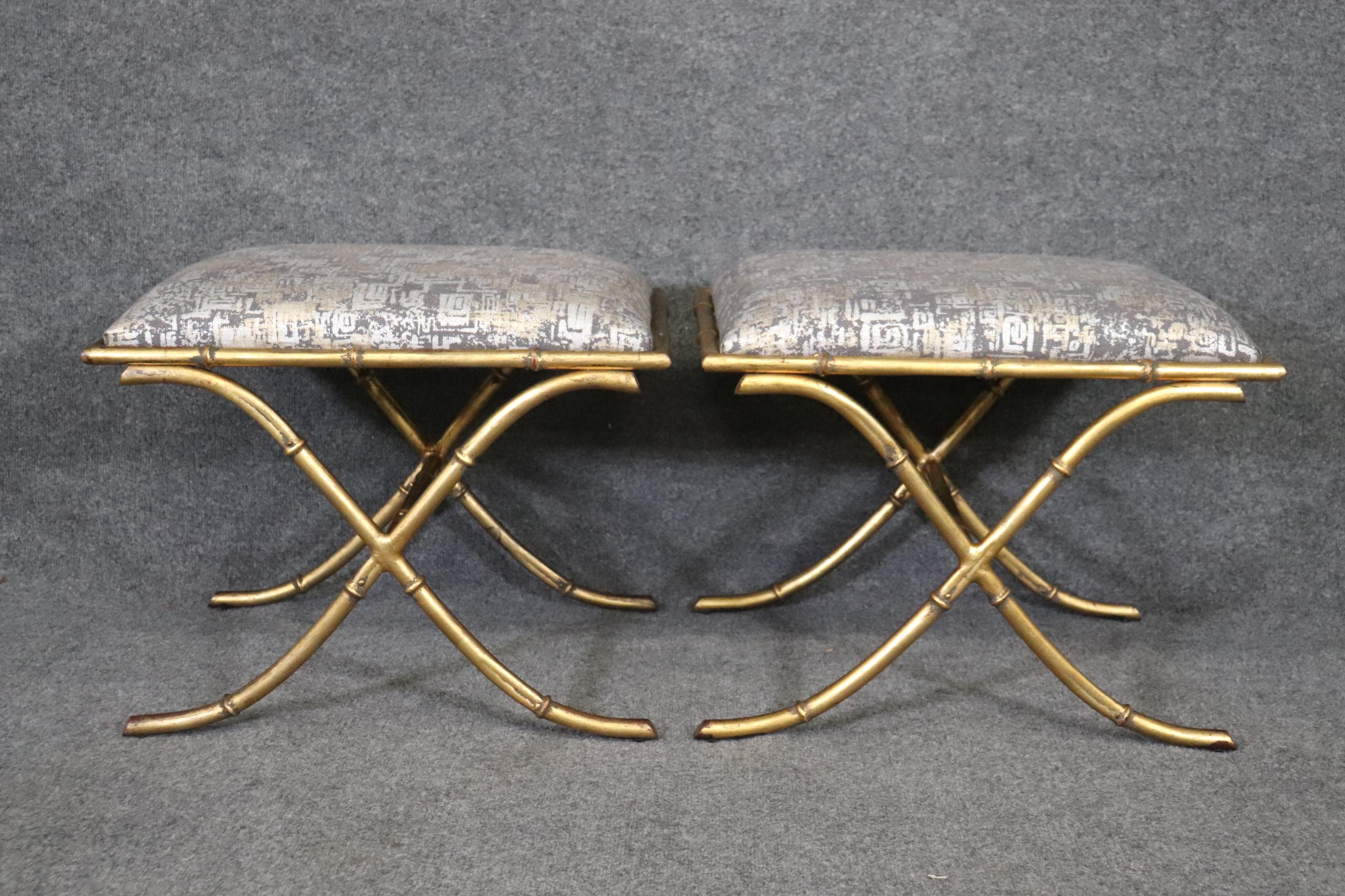 This is a stunning pair of gold gilded metal Maison Bagues style x form benches. They are absolutely gorgeous and very rare and hard to find. The benches measure 16 tall x 22 wide x 18 wide. They date to the 1960s era.