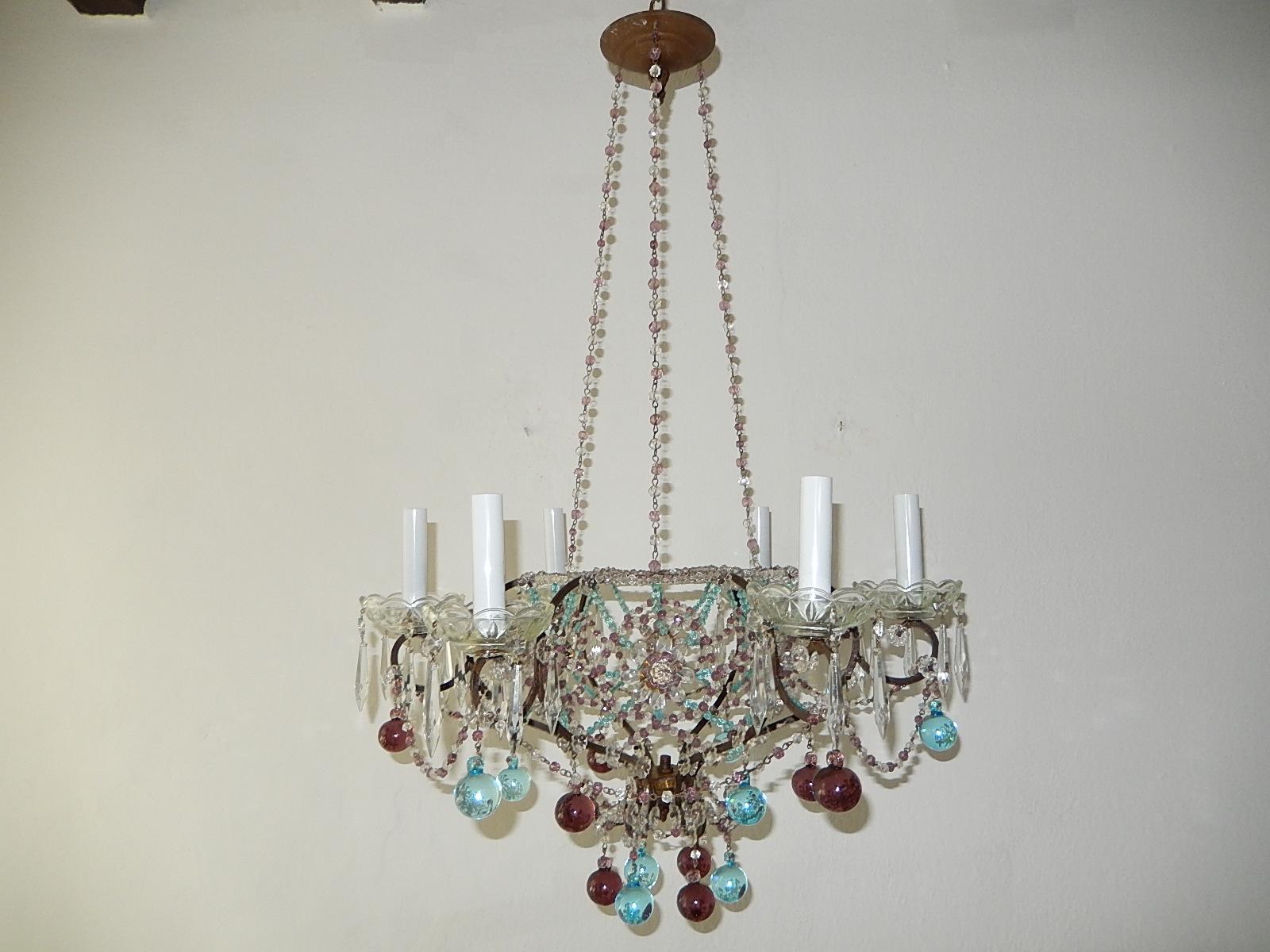 Will be newly rewired with certified US UL sockets for the Usa and appropriate sockets for all other countries and ready to hang.  An absolutely stunning chandelier. Housing 6-light, sitting in crystal bobeches, dripping with vintage crystal prisms.