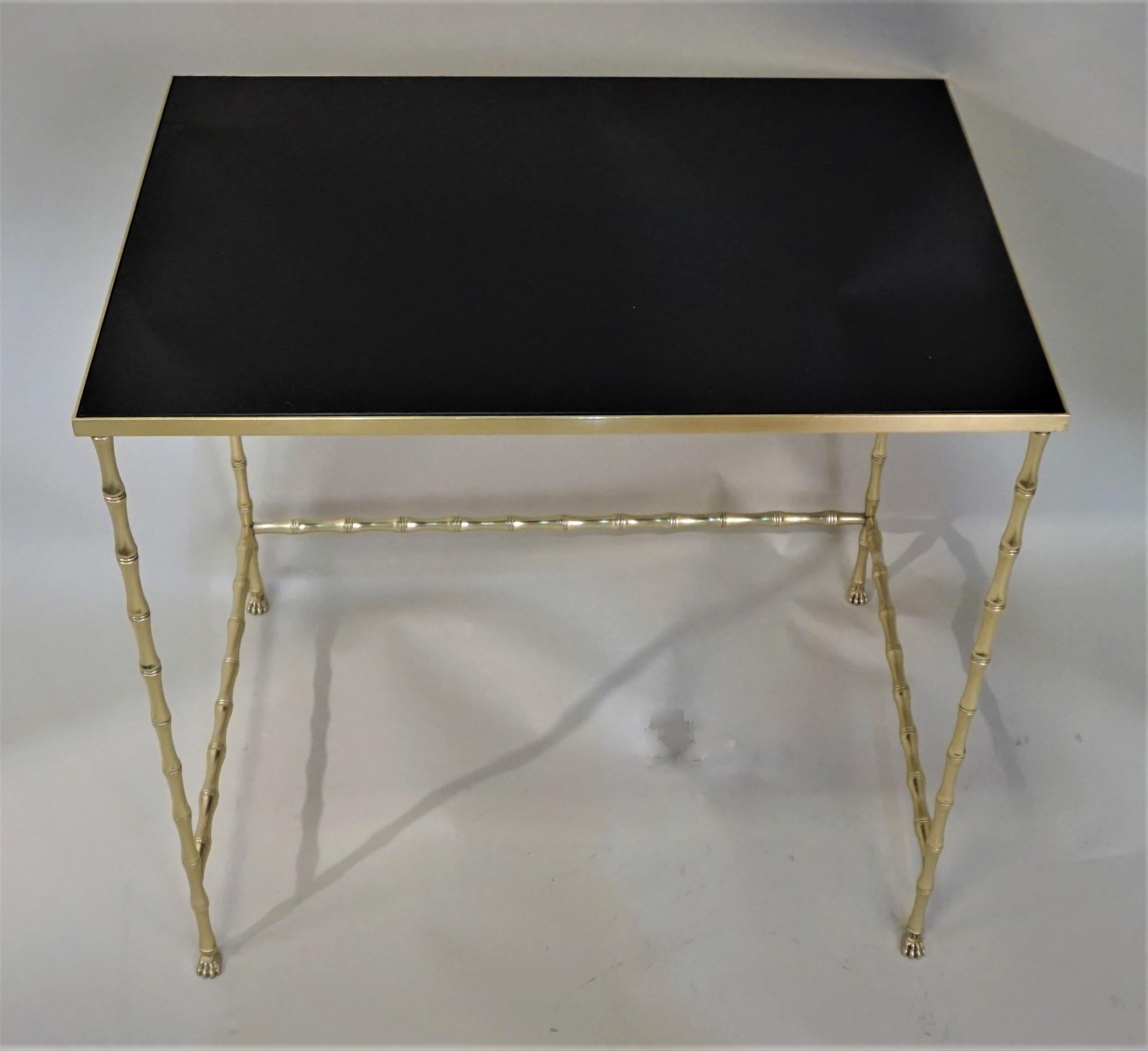 Maison Baguès style bronze nesting table, 3 tables with black glass top.
Measurement: 20.50