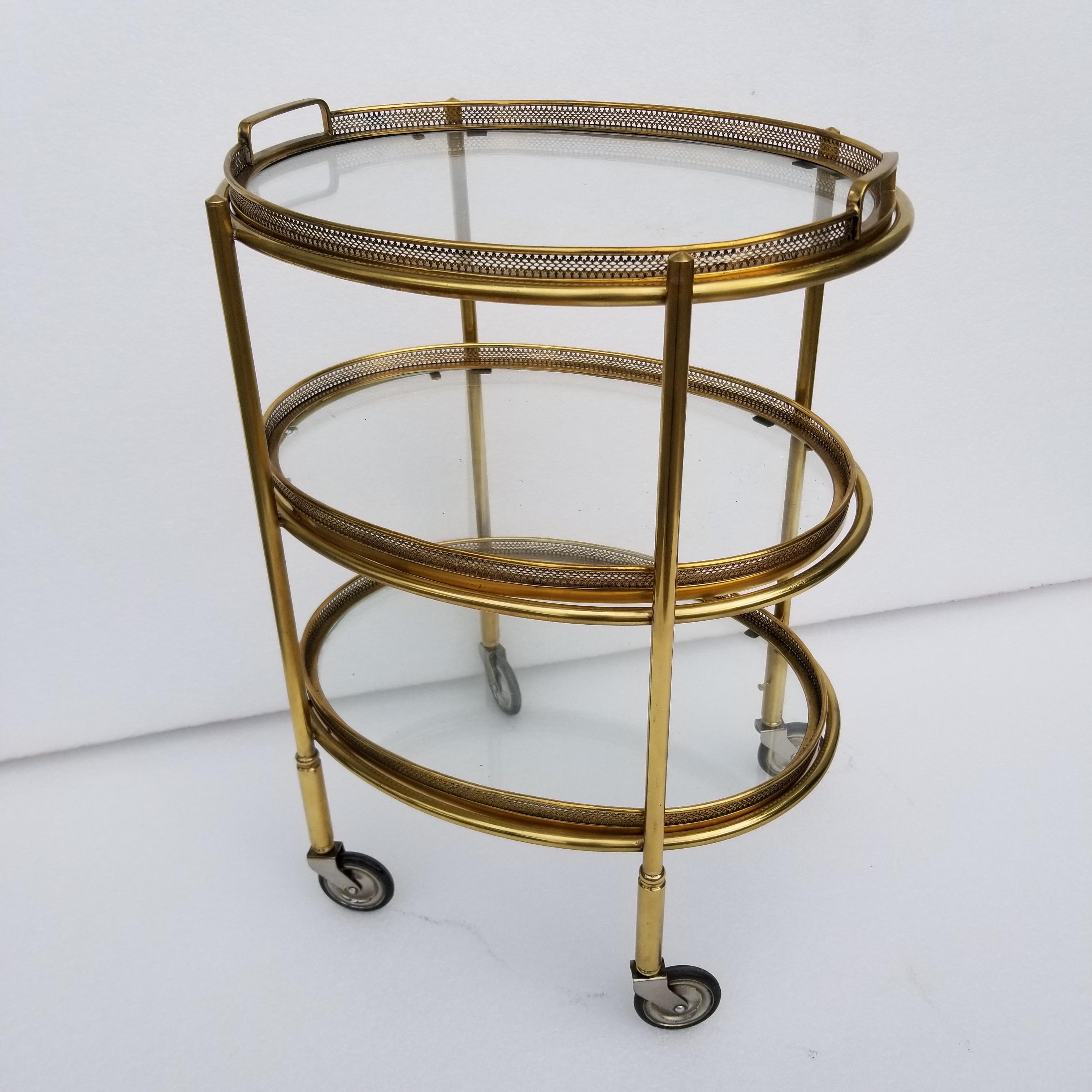 Superb Maison Baguès style three-tier bar cart. Three trays are removable.
Tray dimensions: 15 long, 12 wide.
