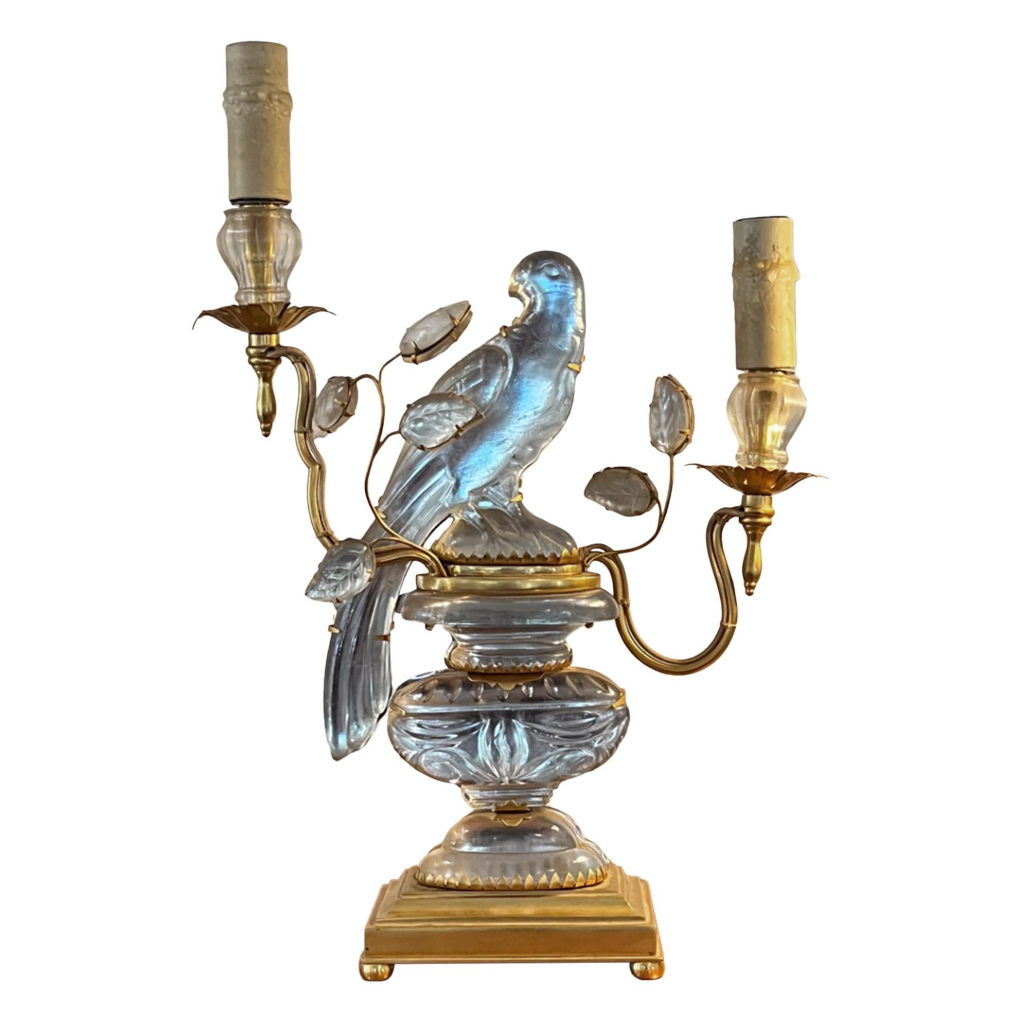 This gorgeous Maison Baguès table lamp was made in Paris, France in the 1960s. With it's iconic parrot and urn design - which is double sided - it's an exceptional light. 

The height to the top of the higher 'candle' is 40cm, to the top of the