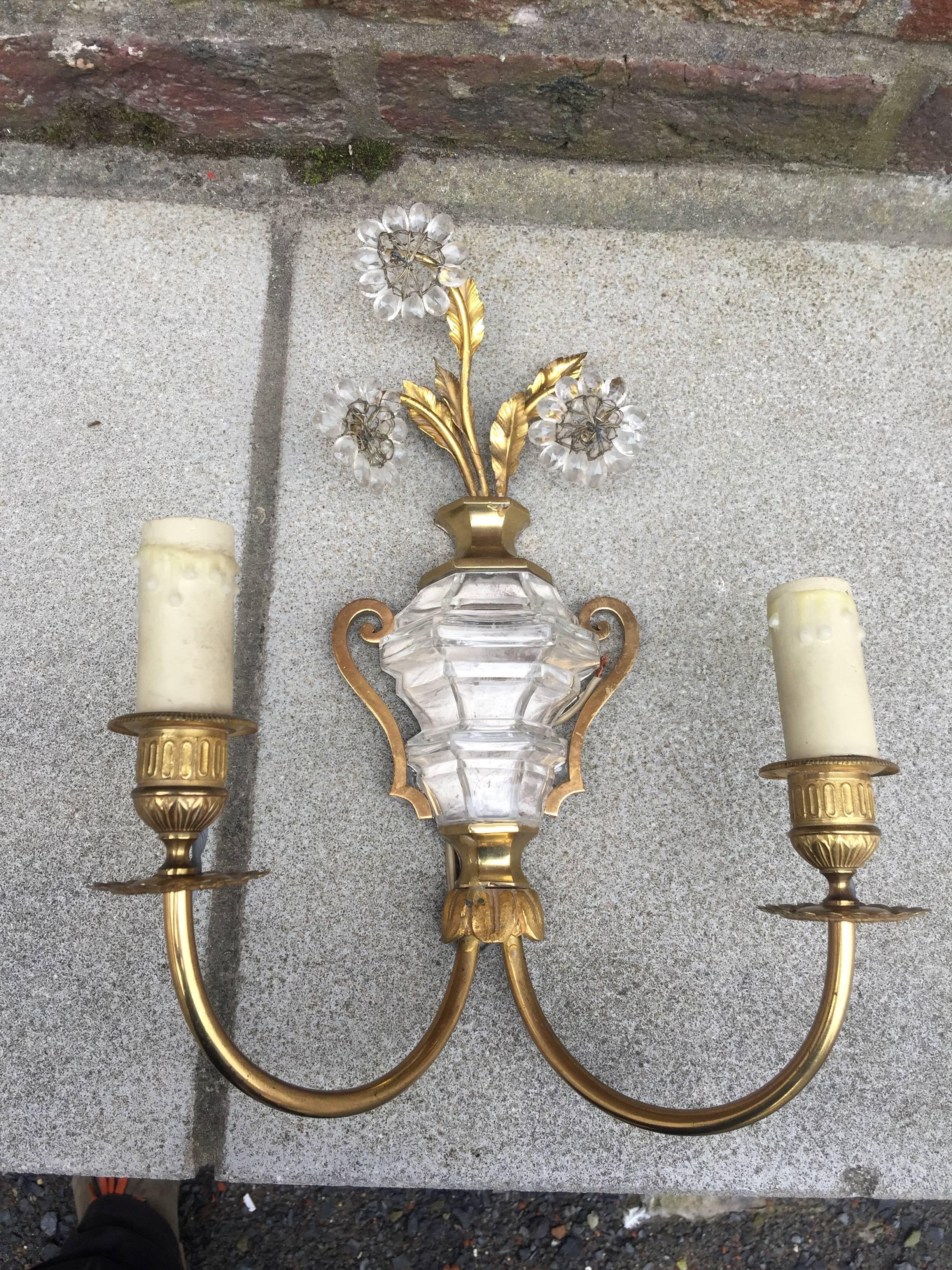 Maison Baguès, two  brass and glass sconces, circa 1950/1960.
Design different on the 2 bobeches (leaves not in the same way)