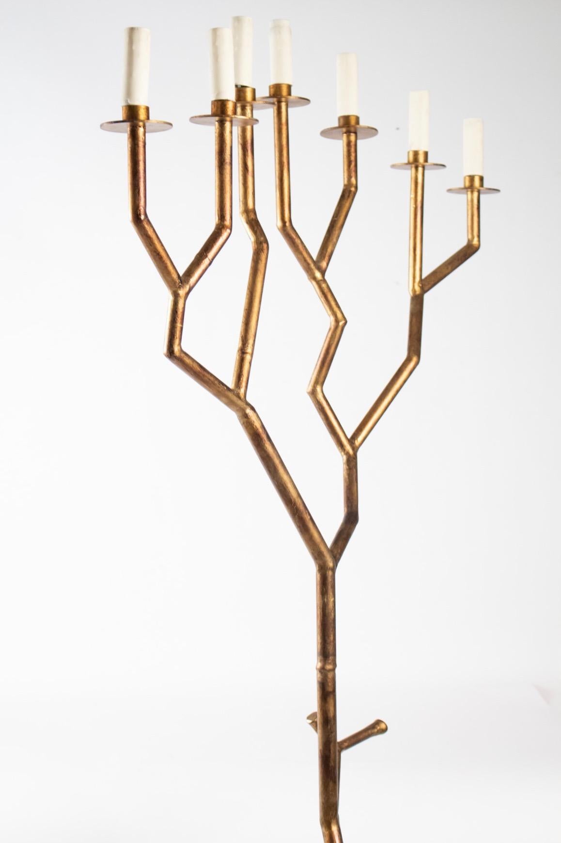 Unique floor lamp made for a private commission from “Ateliers de Ferronneries de la Maison Bataillard” (Maison Bataillard Wrought Iron workshop) founded in 1901.
All made of wrought iron with gilded bronze patina. The floor lamp figures a shrub