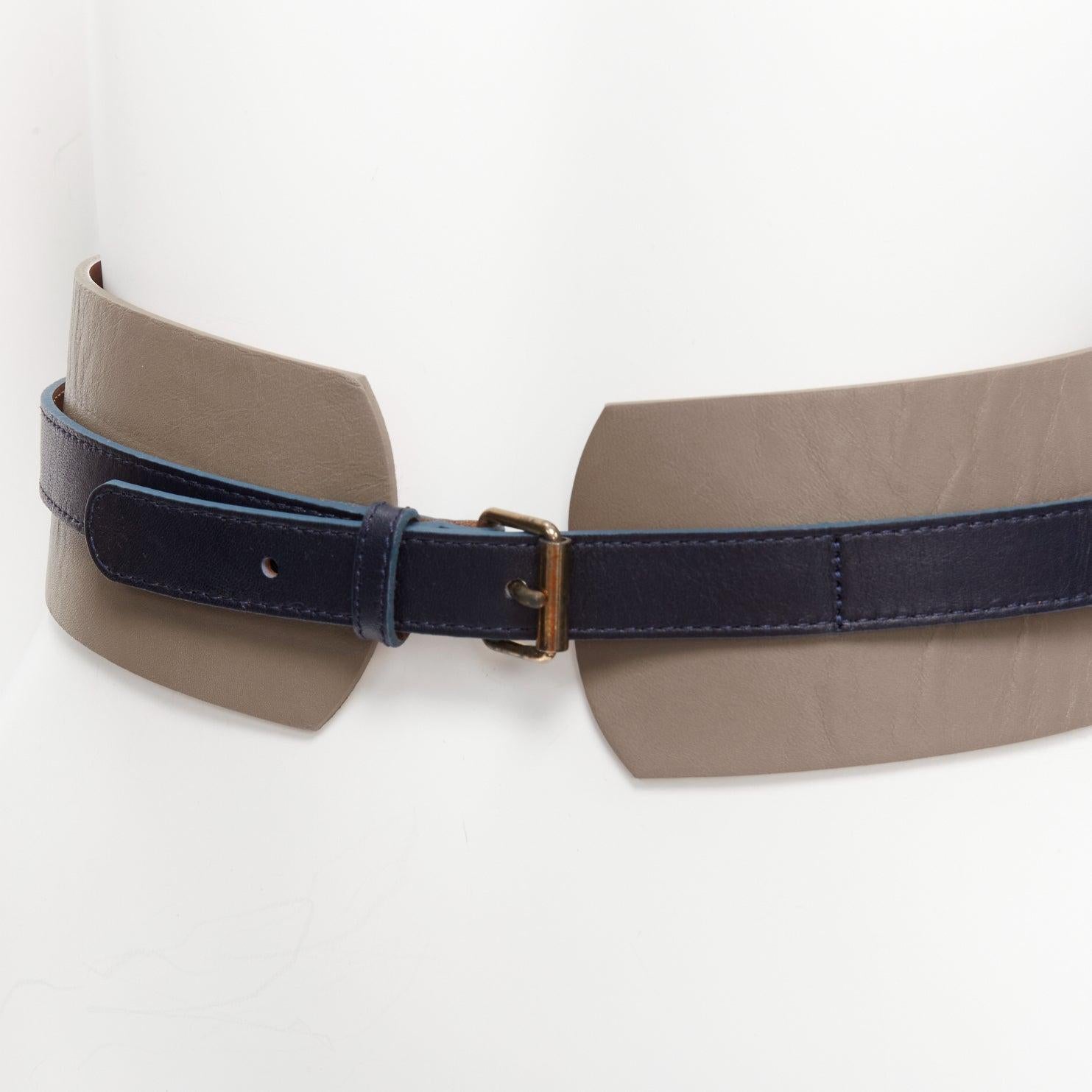 MAISON BOINET brown navy double cowhide leather gold buckle waist belt 70cm
Reference: SNKO/A00361
Brand: Maison Boinet
Material: Leather
Color: Brown, Navy
Pattern: Solid
Closure: Buckle
Lining: Brown Leather
Extra Details: Brown leather with navy
