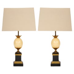 Paire de lampes de table en métal doré et œuf d'autruche attribuée à la Maison Charles
