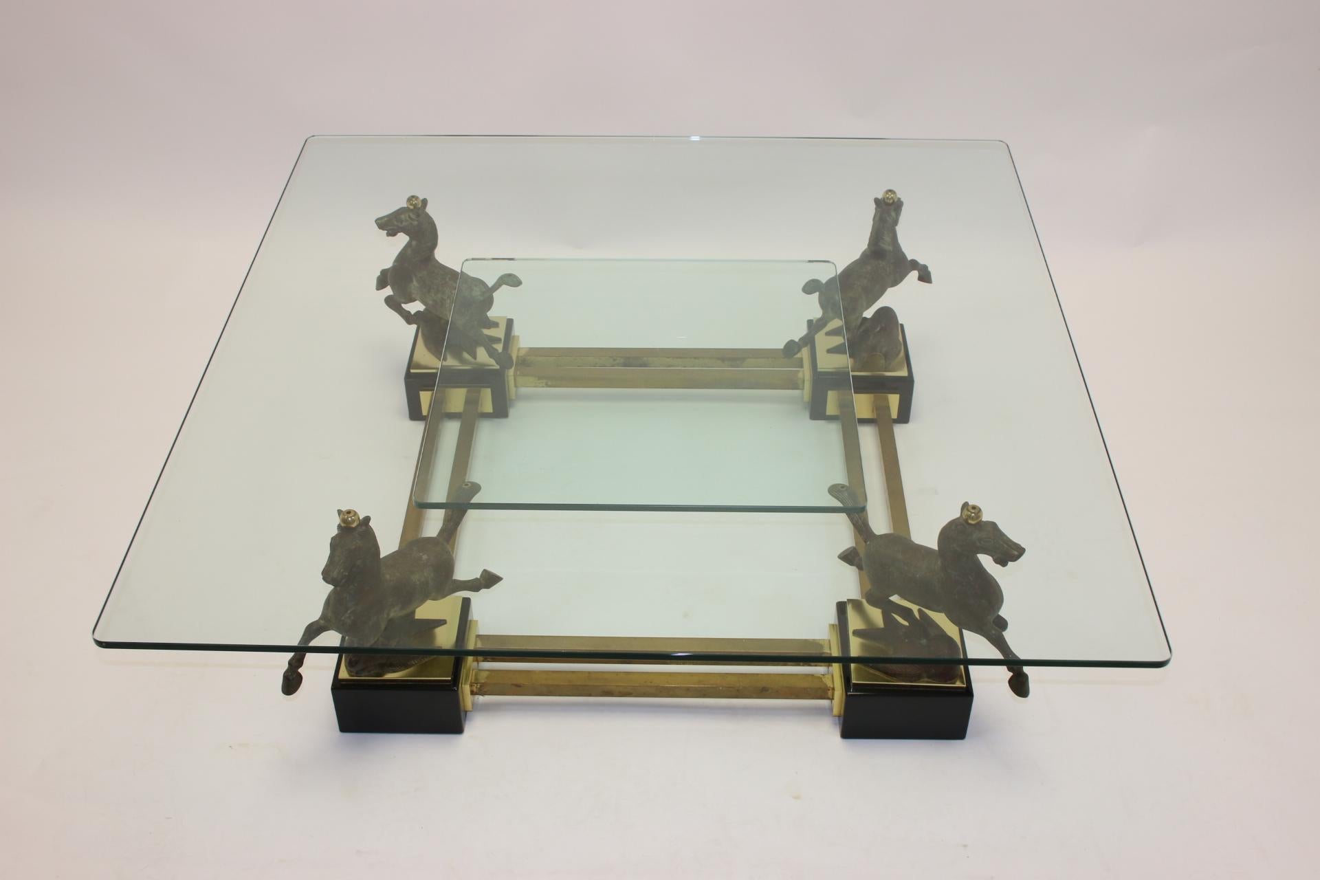 Maison Charles bronze coffee table with horses and 2 glass plates


The design at Maison Charles and bronze and patinated metal is with 4 stone or stone veneered block skirting boards.

A truly unique piece of craftsmanship with varied use of