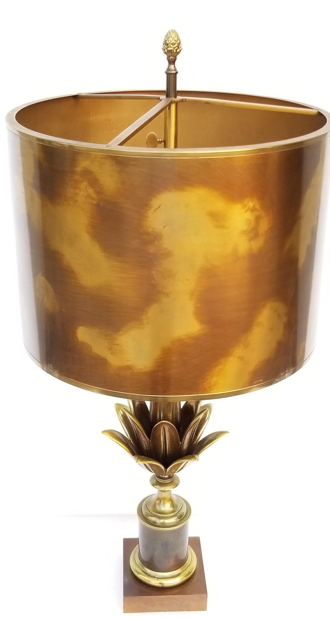 Maison Charles bronze lotus table lamp, two patina bronze, original cloudy finish metal shade.
3 lights, 80 watts max bulb.
  