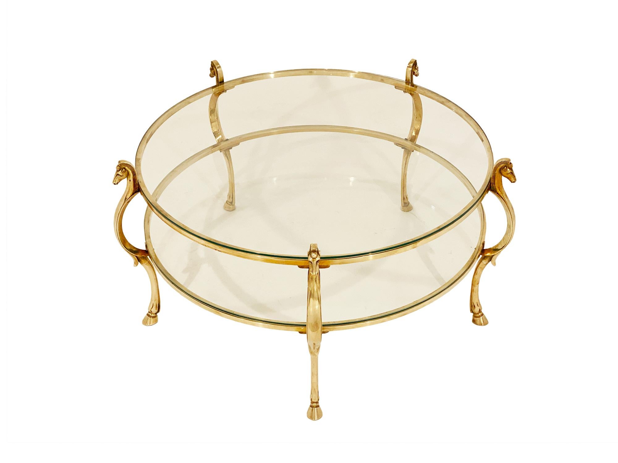 Maison Charles coffee table made of solid brass and featuring five stylized “A l'Etrusco” horses with finely cast details (hooves, heads). This piece made by the iconic midcentury Parisian company Maison Charles is in excellent vintage condition.