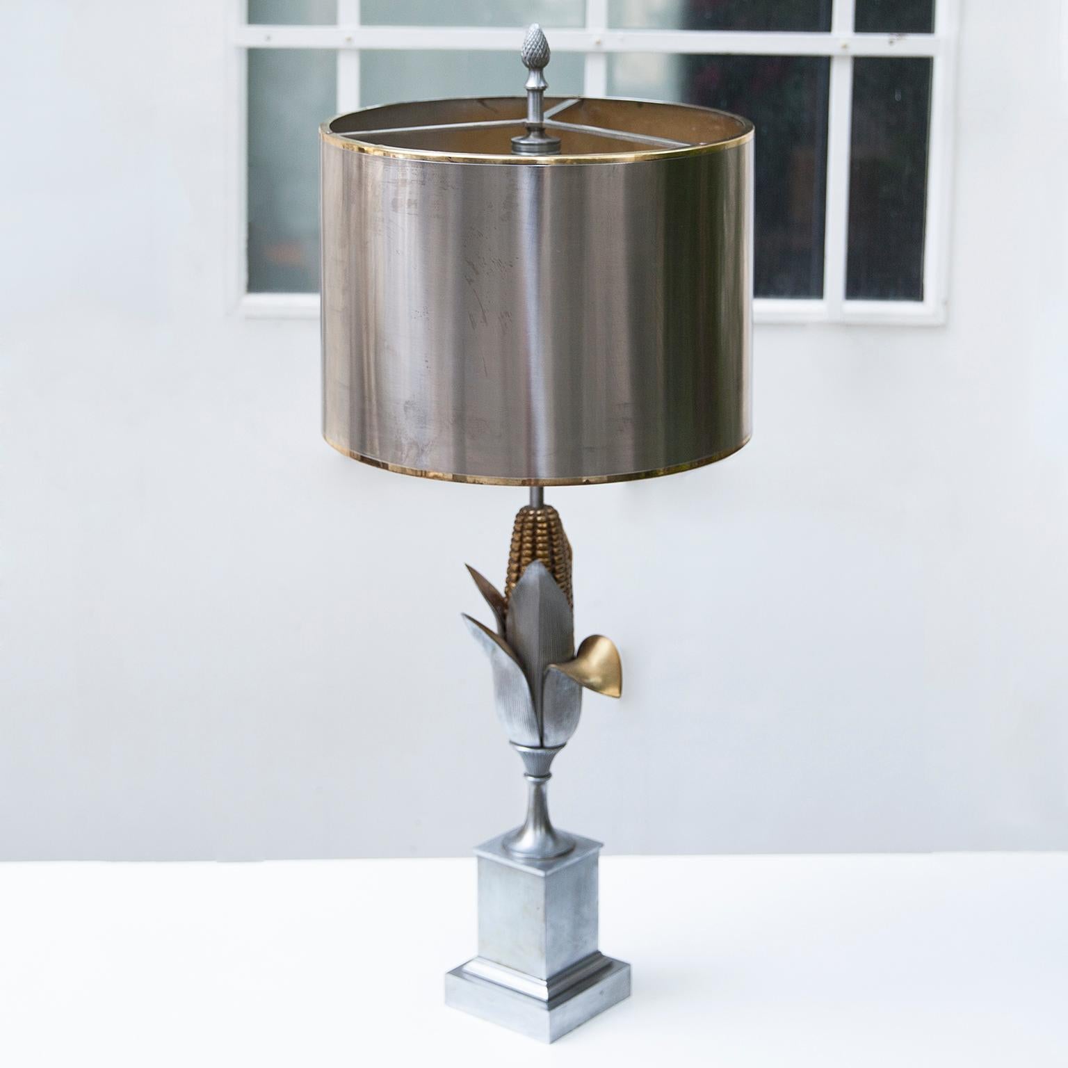 Elegant table lamp made by Maison Charles, Paris in 1970s.

Bicolored bronze and steel, signed on the base.

