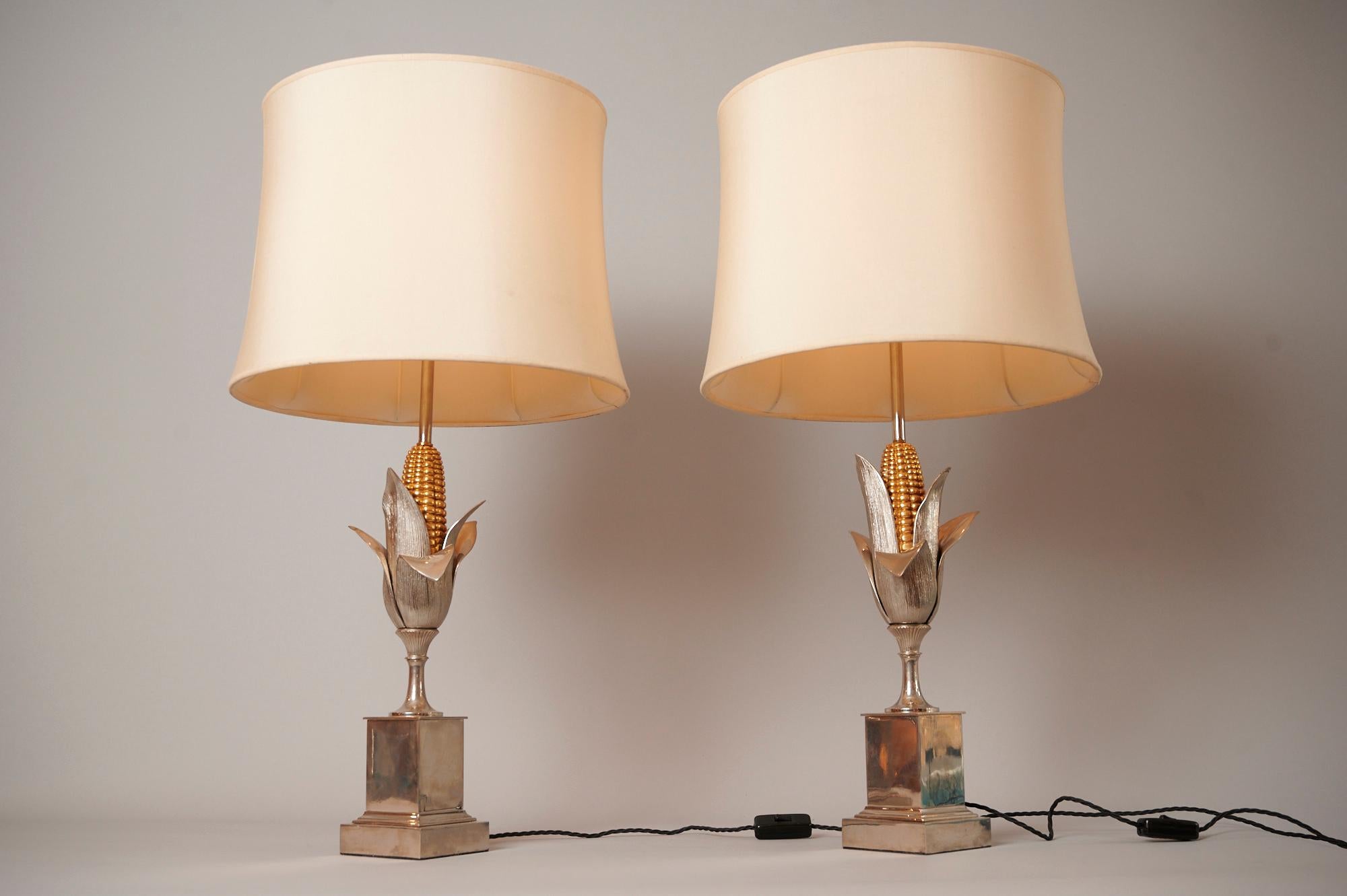 Pair of silvered and gold gilt bronze lamps, each depicting an ear of corn. 

France c1970.

Re wired and fully functional. Each lamp takes 2 x bulbs.