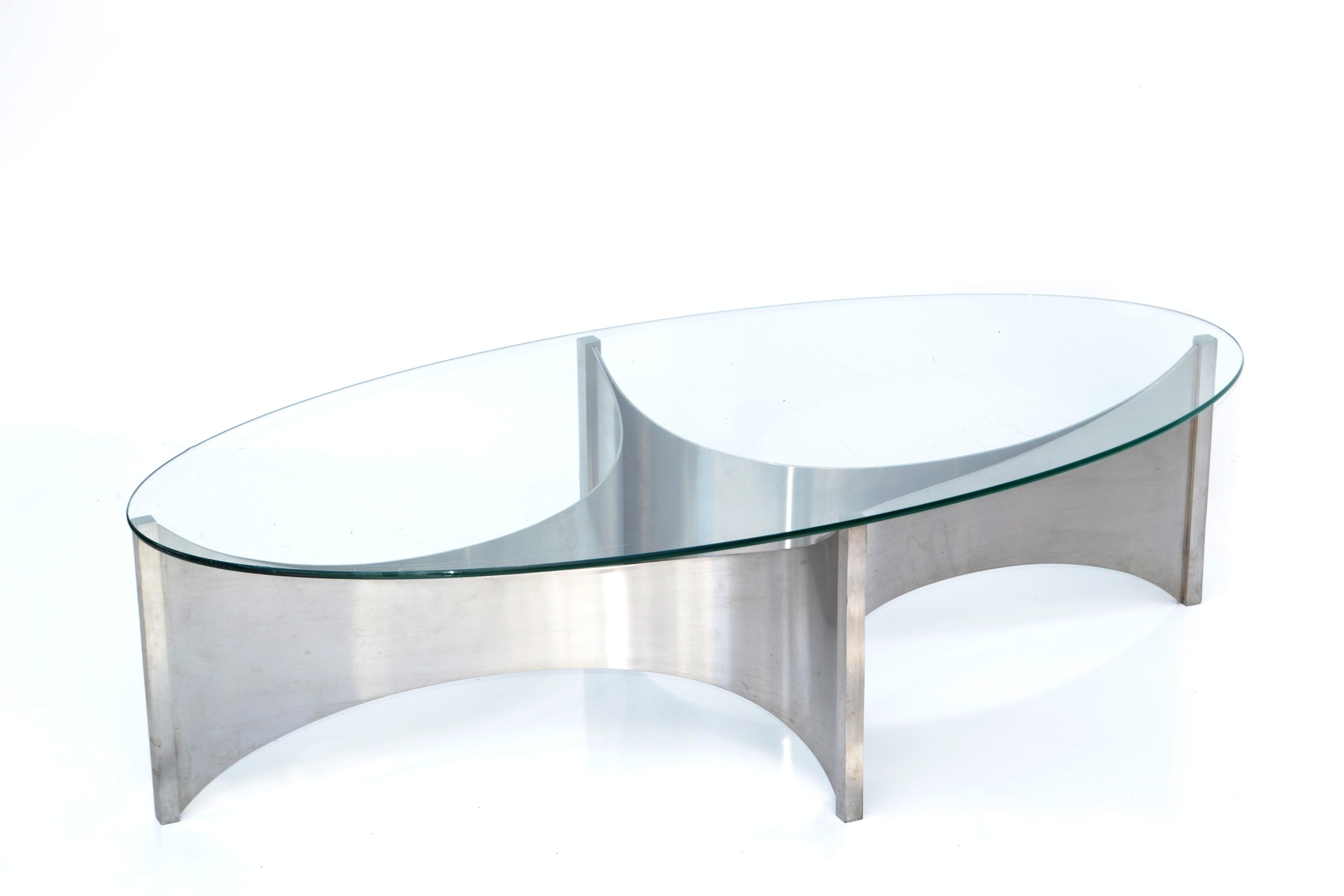 French Mid-Century Modern Maison Charles et Fils 'Voiles' brushed stainless steel coffee table made in 1980.
Sculptural silver base with oval glass top.
Provenance: Page 267 catalogue Charles, 2013.
'Arceaux/Voiles.'
Dimensions:
Base: 46.5 x 23