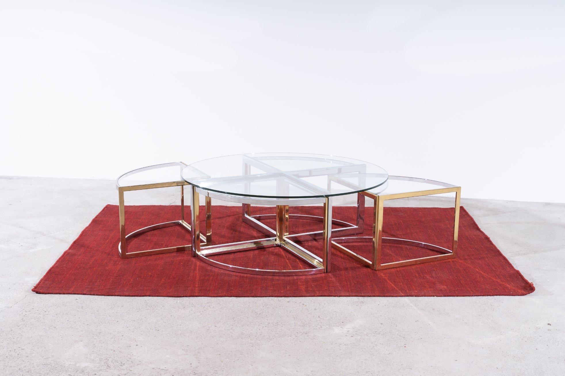 Extremely rare Maison Charles coffee table with 4 side tables in chromed and brass plated steel. 

Very handy, because you can simply slide the four side tables under your table.

Maison Charles was originally founded in 1908 by Ernest Charles