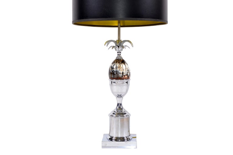 Superb Art Deco table lamp by Maison Charles nickel-plated finish with brown and beige pattern resin acorn in the center.
US rewiring and takes two-light bulbs max. 40 watts.
No shade.
 