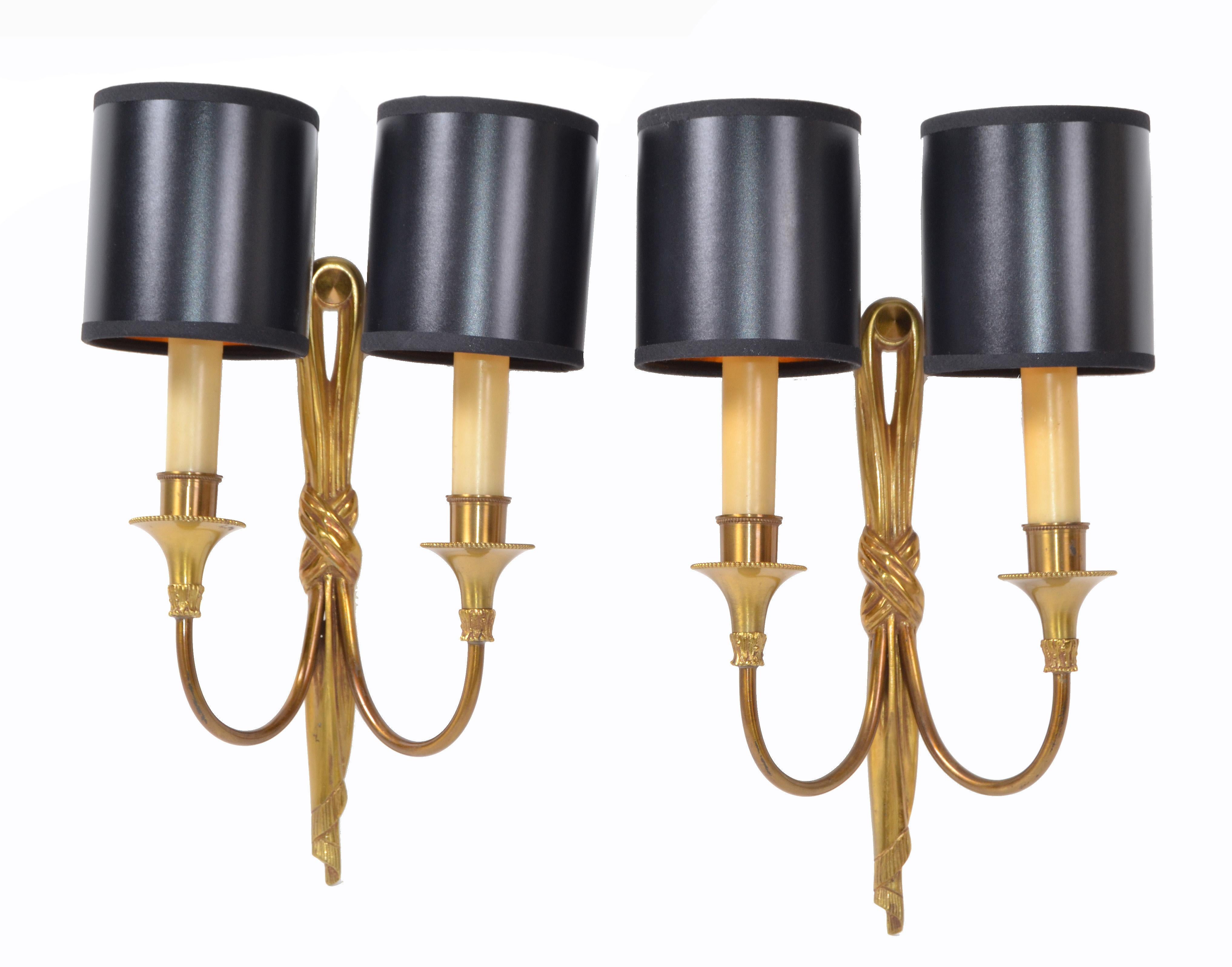 We offer a pair of French bronze Maison Charles drapes wall sconces with sleeves, made in France.
Signed and numbered on the Backplate.
In perfect working condition and each sconce uses 2-light bulb 40 watts max.
Backplate measures: 11.75 x 1.13