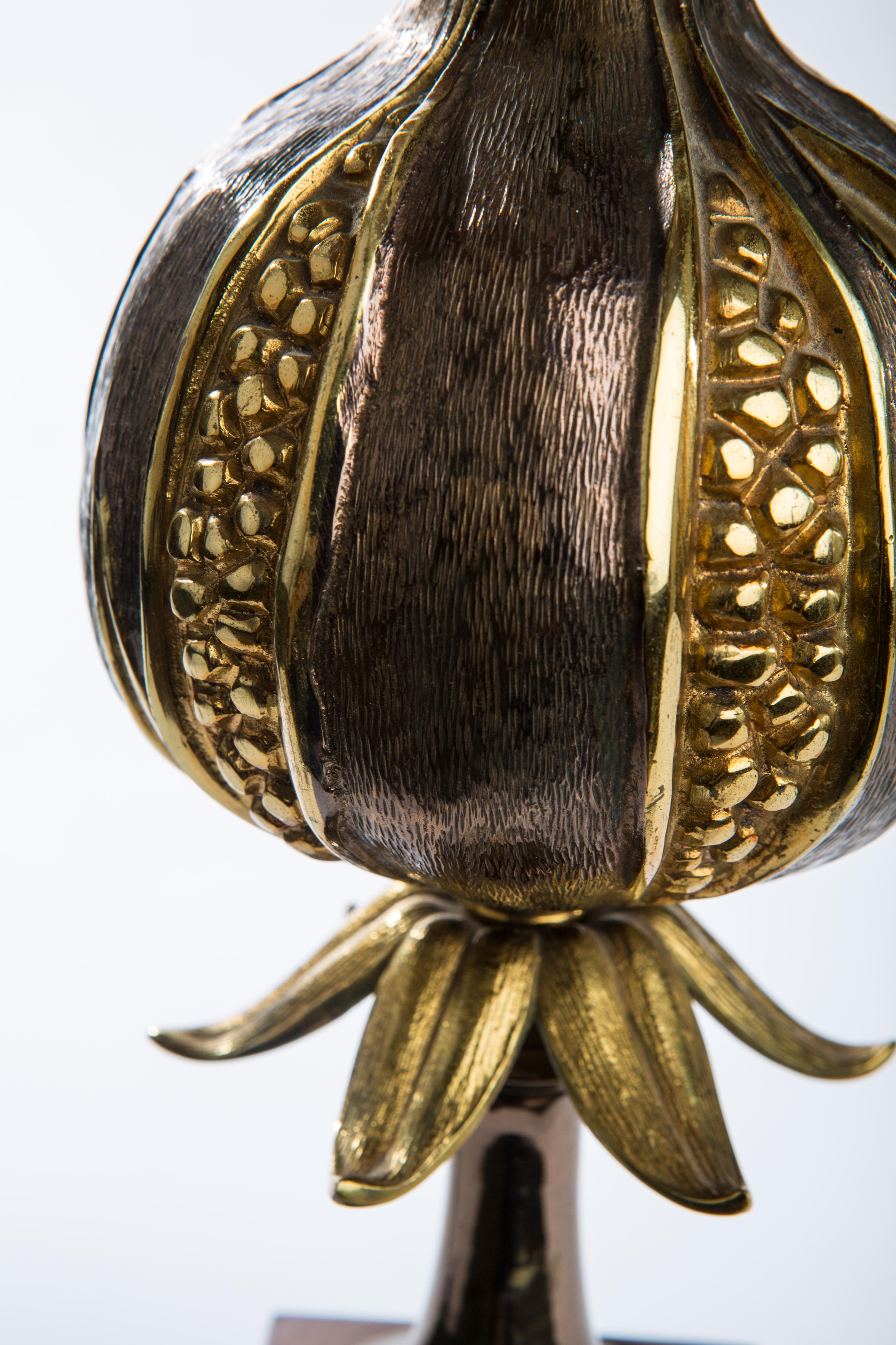 A stunning handcrafted table lamp by the renowned Maison Charles of Paris. 
Made of solid hand cast and carved Bronze with a seamless spun brass shade with finial fitting.
The Pomegranate, leaves and stem are all hand cast individually and set on