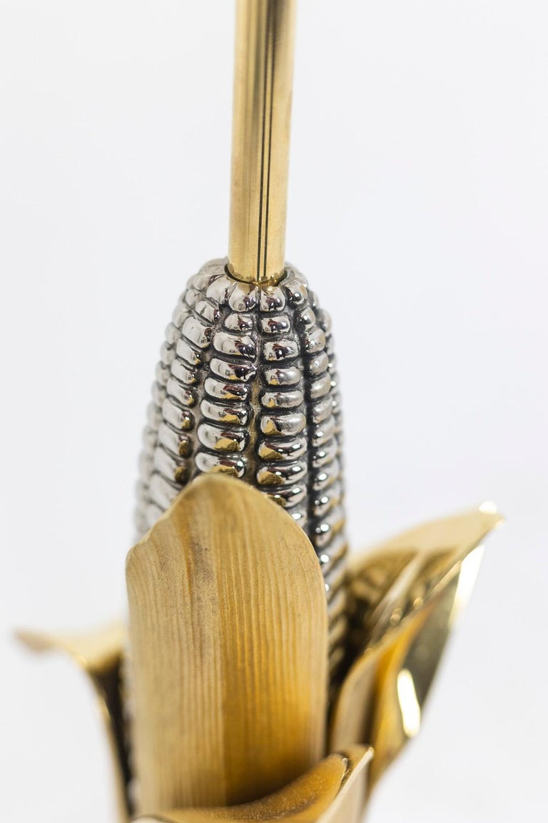 Maison Charles, Signed. 

Lamp in gilt and silver bronze, representing an ear of corn. Shade in silver colored sheet metal. Signed on the base.

French work realized in the 1970s. 

Dimensions : H 83 x W 15 x D 13 cm

Reference : LS4757571.