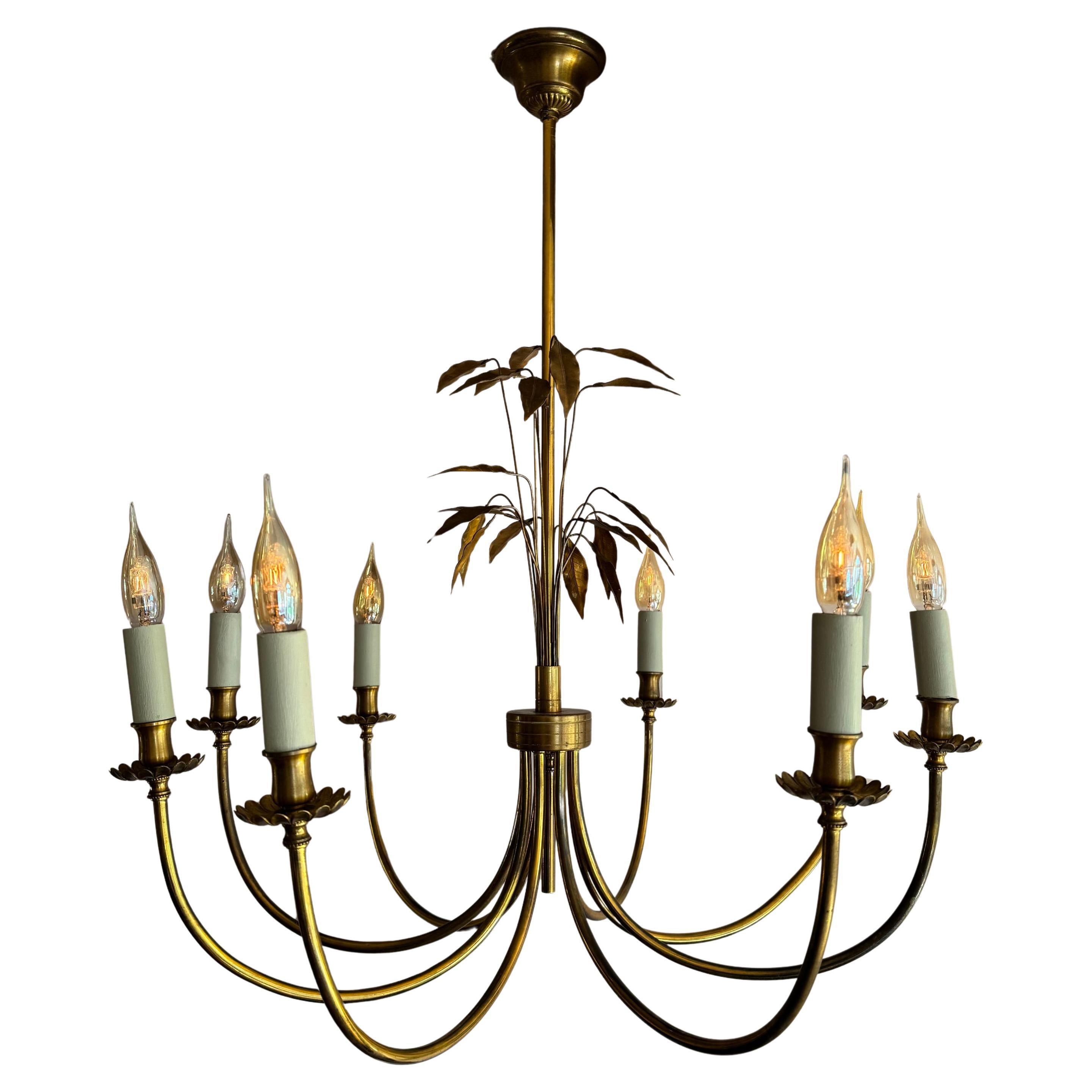 Maison Charles grande lampadario a 8 bracci in metallo dorato