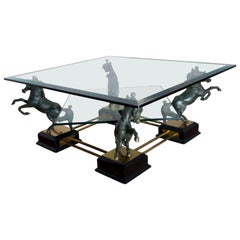 Maison Charles table basse française mi-siècle moderne à cheval en laiton, années 1960