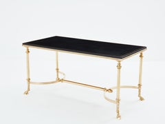 Maison Charles neoclassical coffee table brass black leather 1970s