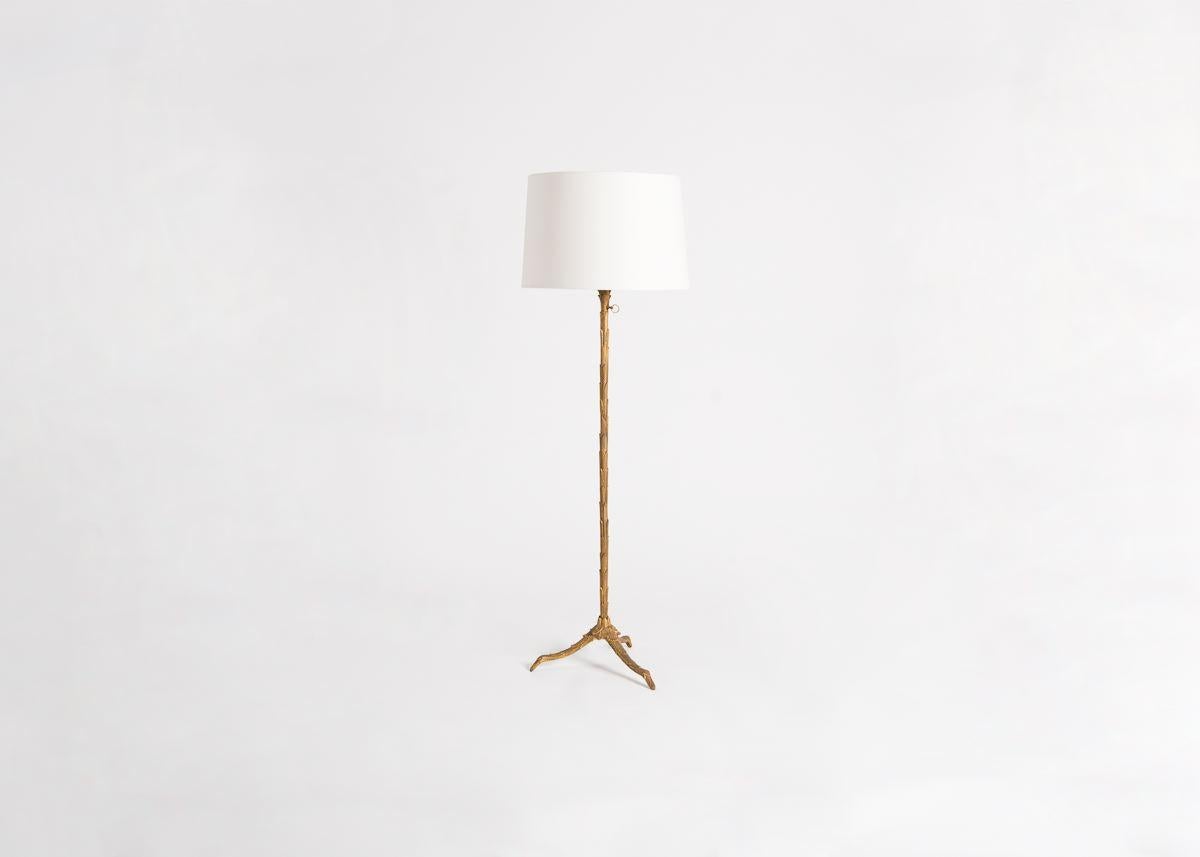 Adjustable height bronze floor lamp by Maison Charles. Stamped on base.

This model is illustrated in L'e´clairage dans la Maison, Editions Charles Massin, Paris, p. 50. and on p. 59 of the Catalogue E. A. Charles & Fils.