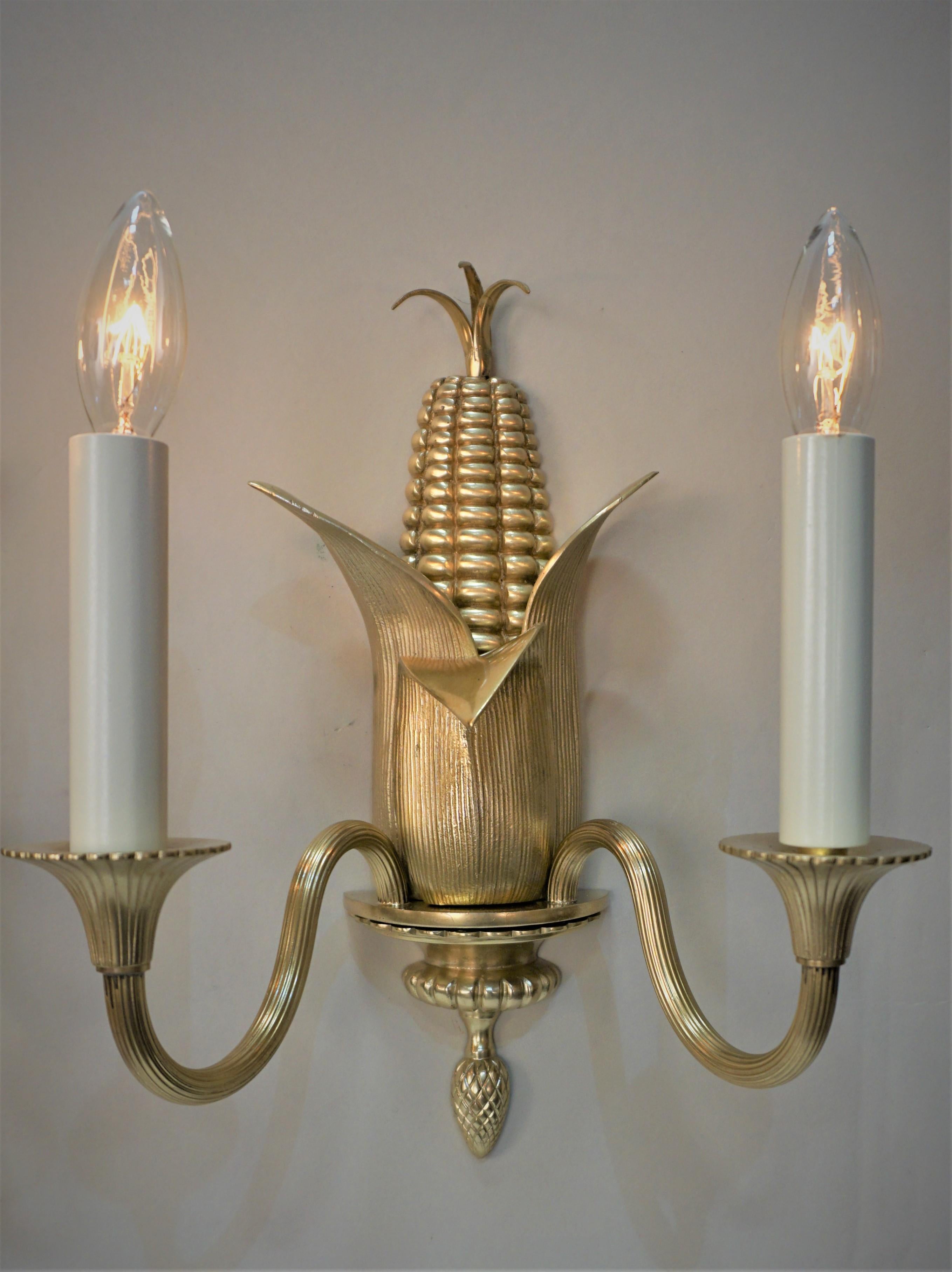 Pair of corn design Maison Charles bronze wall sconces.
Back measurement: the widest point is 2.75