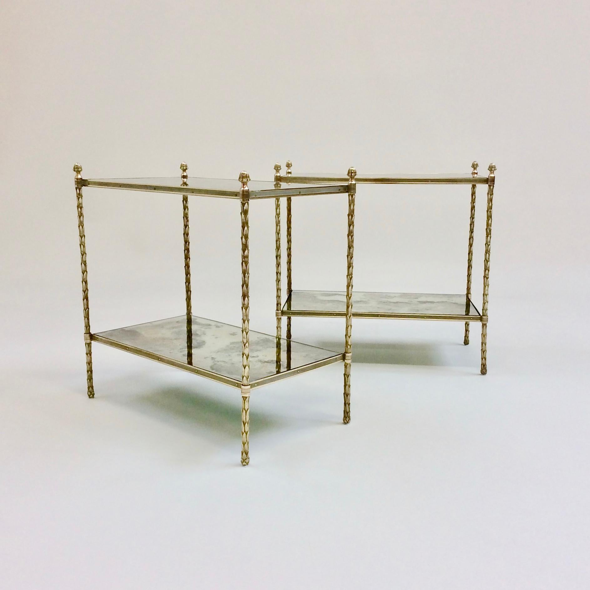 Magnificent pair of Maison Charles two tiers side tables, circa 1960, France.
Gilt bronze foliage decor, brass edge and oxidized mirrored glass tops.
Dimensions: 63 cm W, 36 cm D, 63 cm H.
All purchases are covered by our Buyer Protection