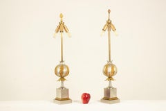Maison Charles. Pair of bronze vgrenadeb lamps. 1970s.