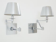 Maison Charles pair of brushed steel adjustable swing-arm sconces 1960s