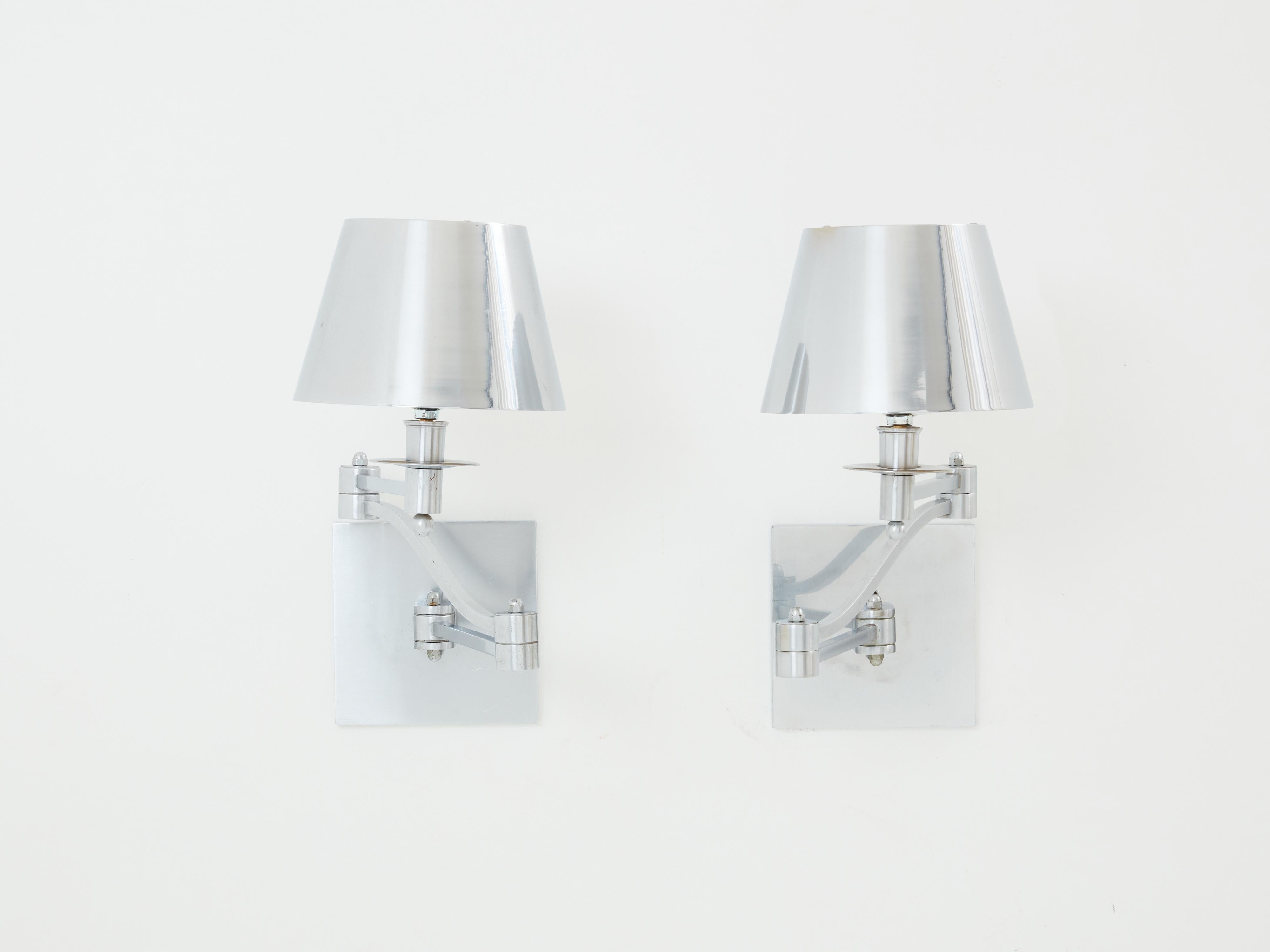 French Maison Charles pair of brushed steel adjustable swing-arm sconces 1960s For Sale