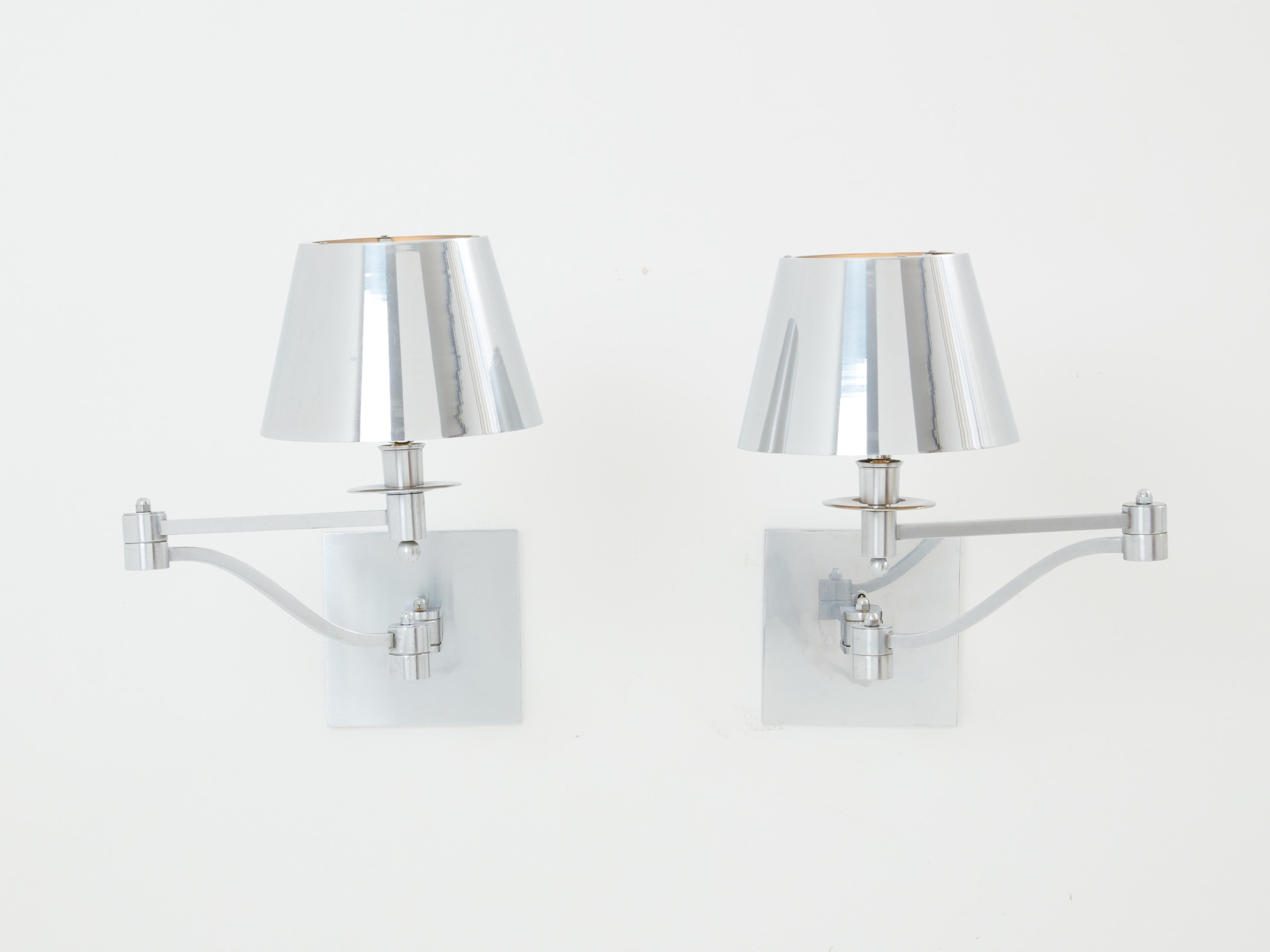 Mid-20th Century Maison Charles pair of brushed steel adjustable swing-arm sconces 1960s For Sale