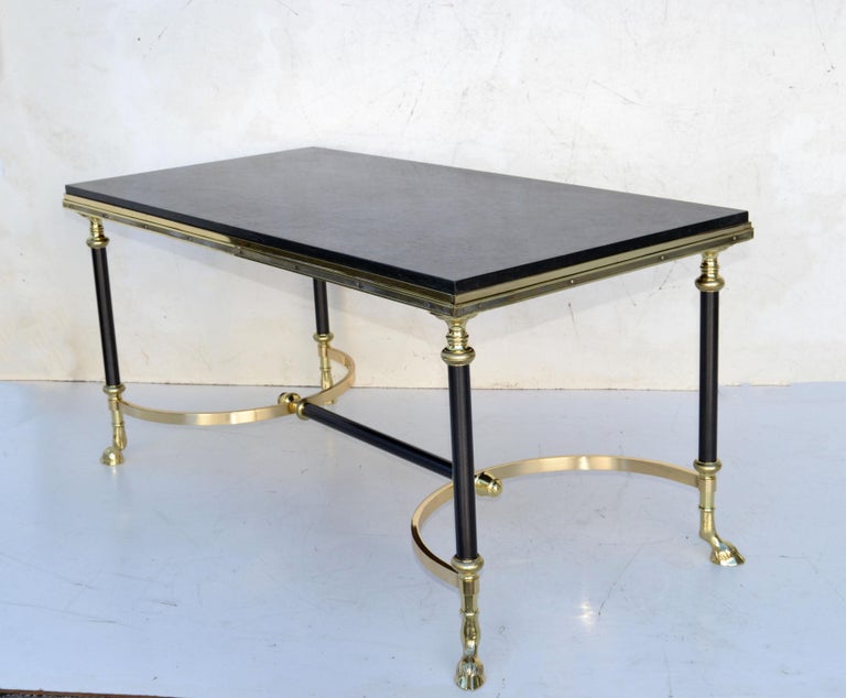 Superb Neoclassical Maison Charles Coffee Table made out of Steel, two patina polished Brass and Wood which supports the thick dark gray-greenish Marble Top.
Marble measures:
19.5 x 1 x 39.5 inches.
Stunning French Craftsmanship. 
Newly restored.