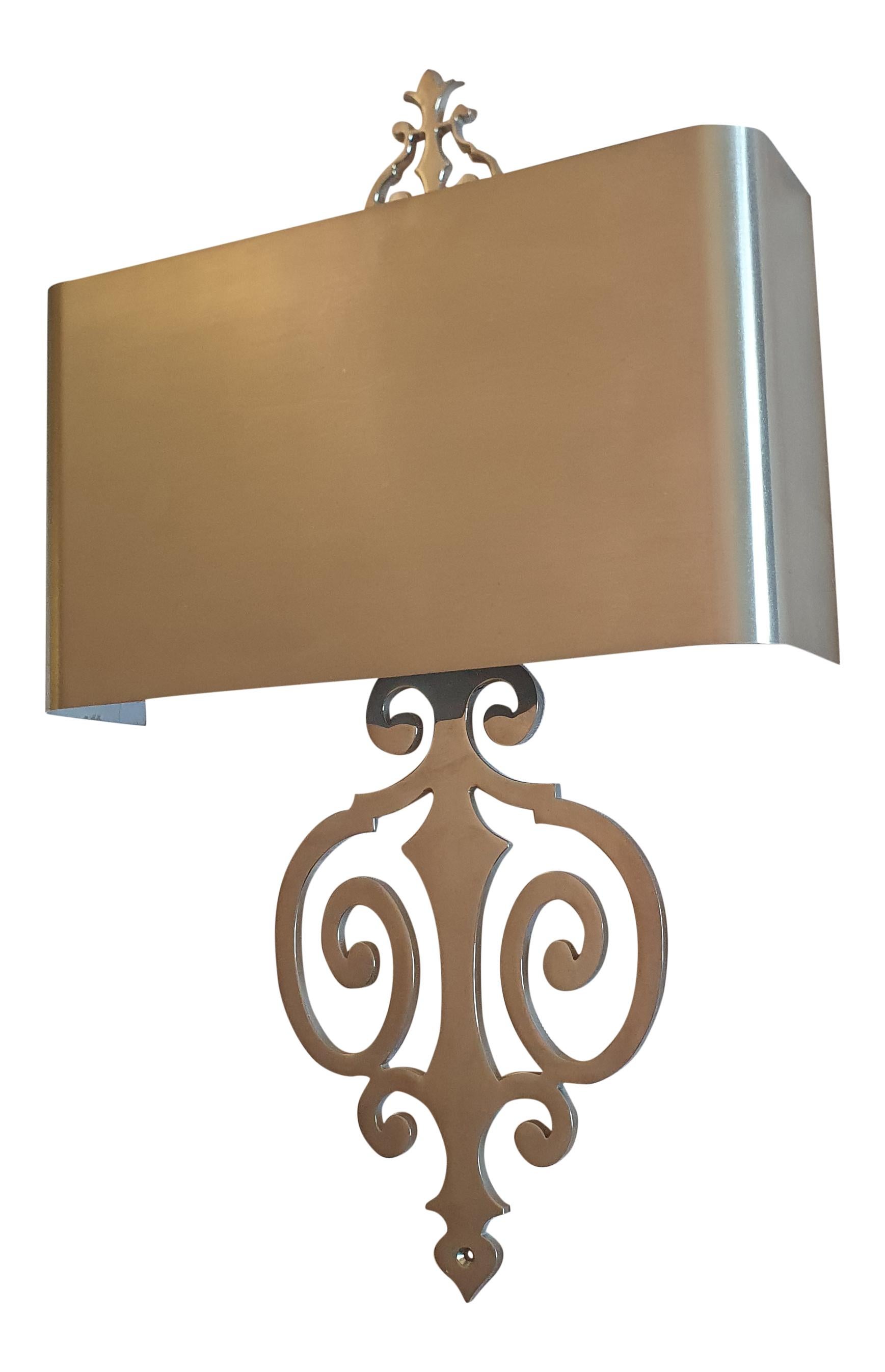 This stunning single Rinceaux wall sconce by the renowned Maison Charles is a true classic by the famous lighting manufacturer and still a best seller today since the 1960s
Made of solid cast Bronze back plate using the sand casting technique and