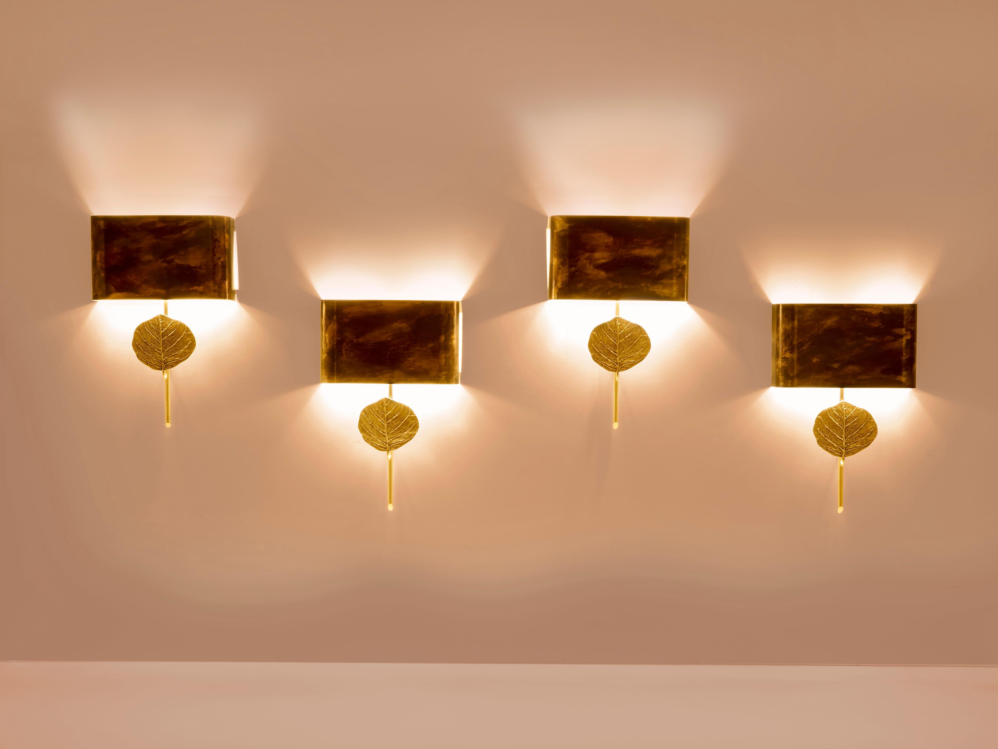 Mid-Century Modern Maison Charles set of four patinated bronze and brass sconces 1970s For Sale