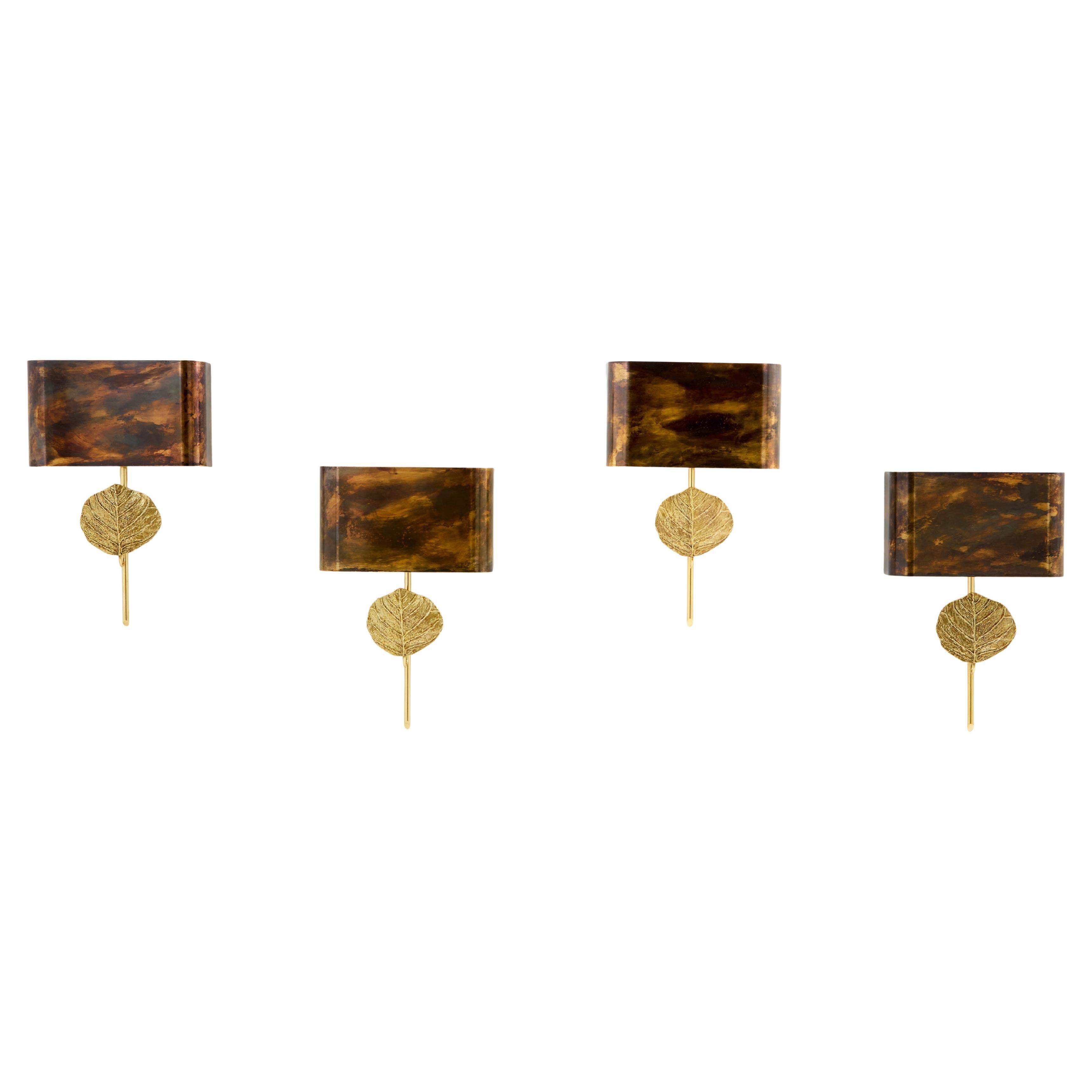 Maison Charles set of four patinated bronze and brass sconces 1970s