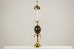Maison Charles. Signed egg lamp in bronze and resin. 1970s.