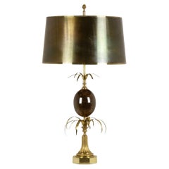 Maison Charles. Signed egg lamp in bronze and resin. 1970s.