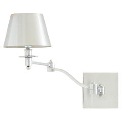 Maison Charles single brushed steel adjustable swing-arm sconce 1960s