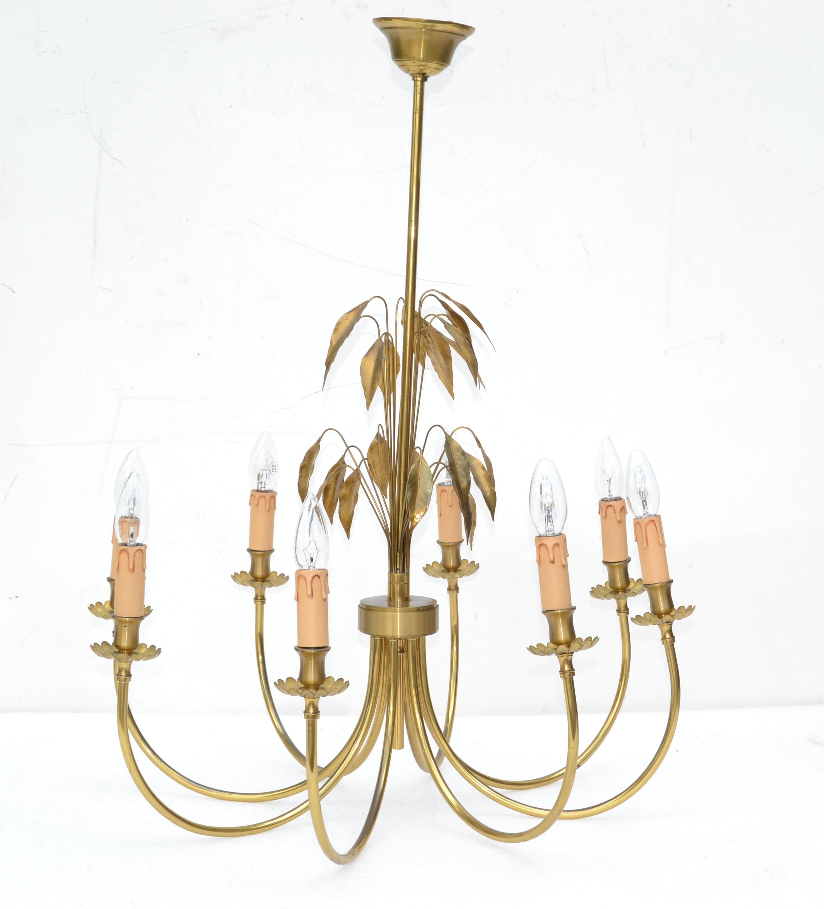 Maison Charles style 8 light chandelier 'Feuilles', brass & gold leaf branches in the center.
Comes with Canopy and takes 8 candelabra E14 light bulbs, max 40 watts.
In all original Condition with the French Wiring. 

 
 