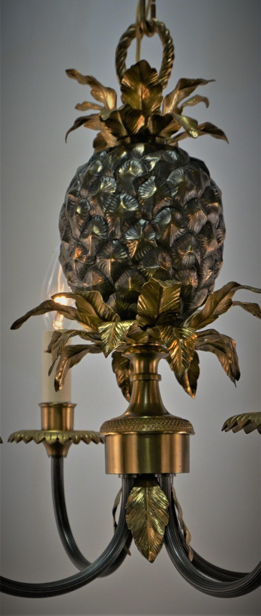 Maison Charles four light pineapple two-tone bronze chandelier.
Total height including all the chain is 28