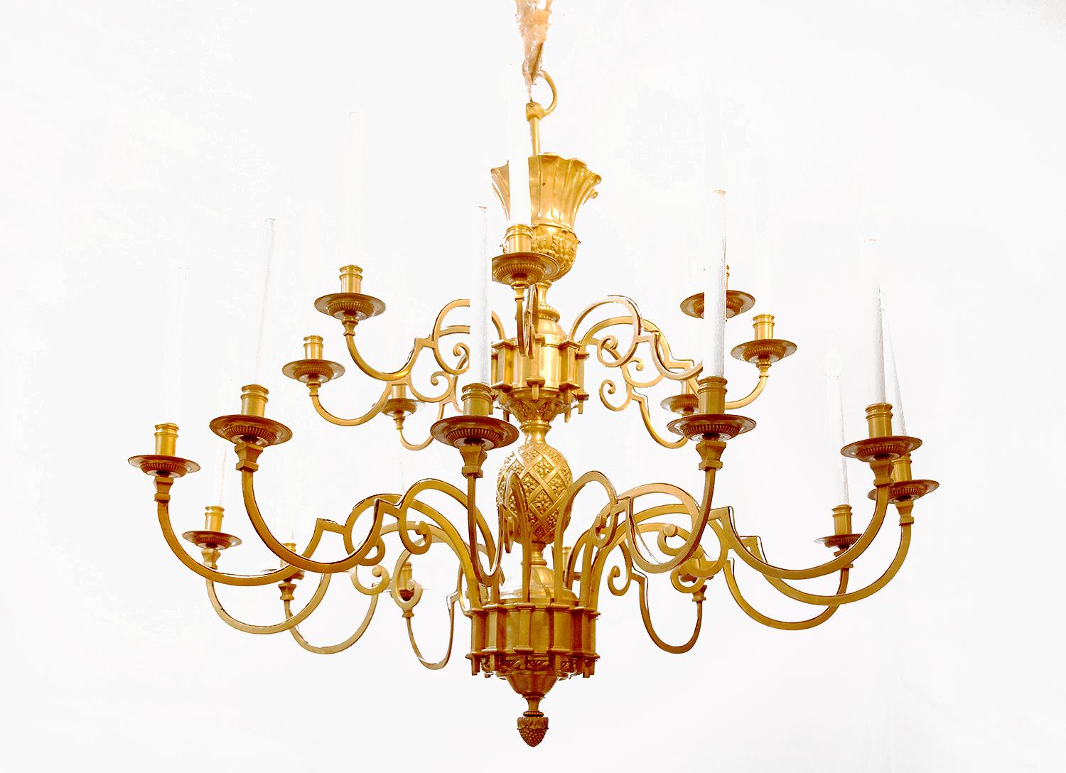 Maison Delisle, Large chiseled and gilt bronze chandelier with 20 candle branches in two rows. The upper dome with scalloped edges standing on gadrooned stand, from which large leaves acanthus started. Just above, the first ten scrolls candle