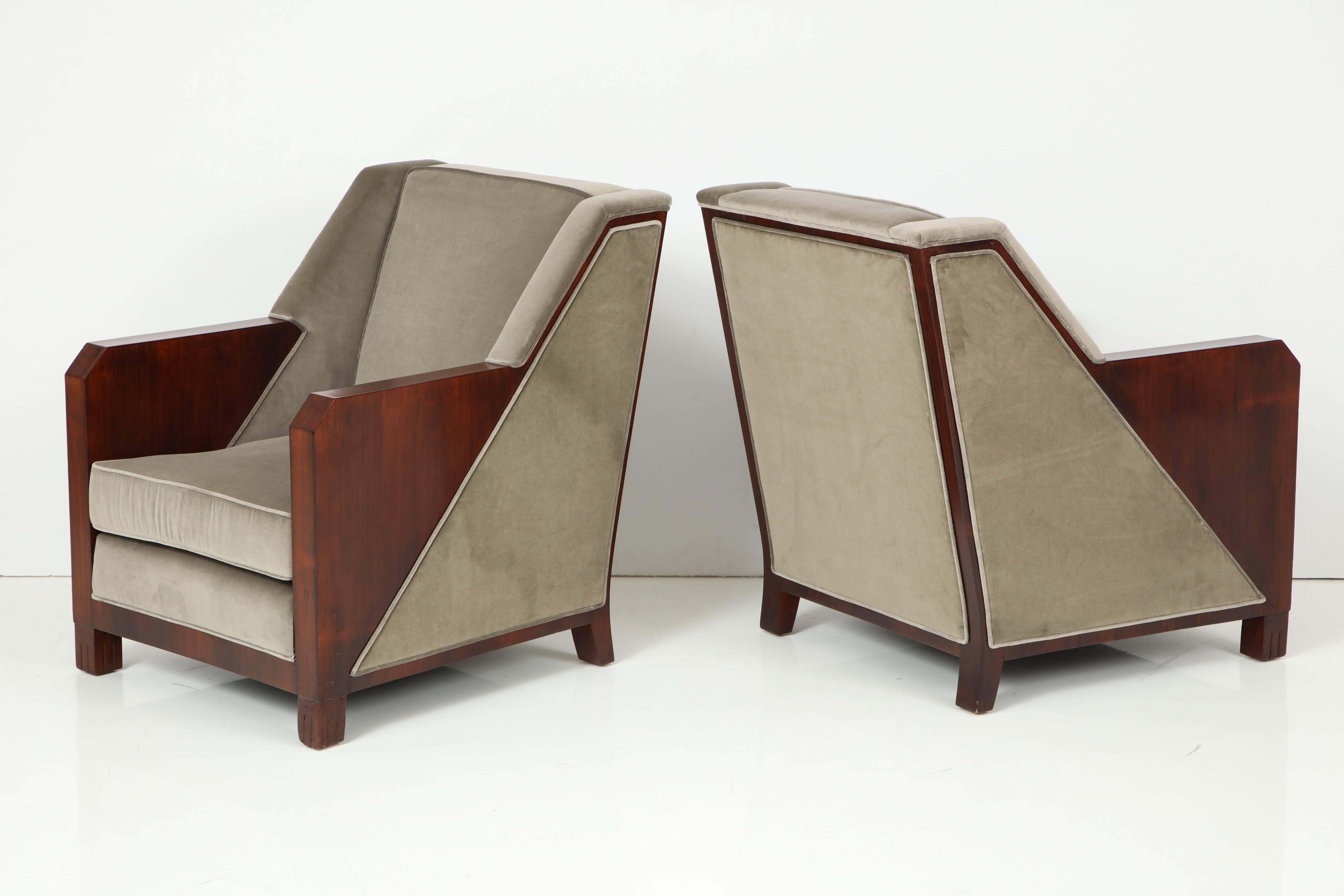 Pair of modernist rosewood armchairs by Maison Dominique, Branded signature to frame.
 