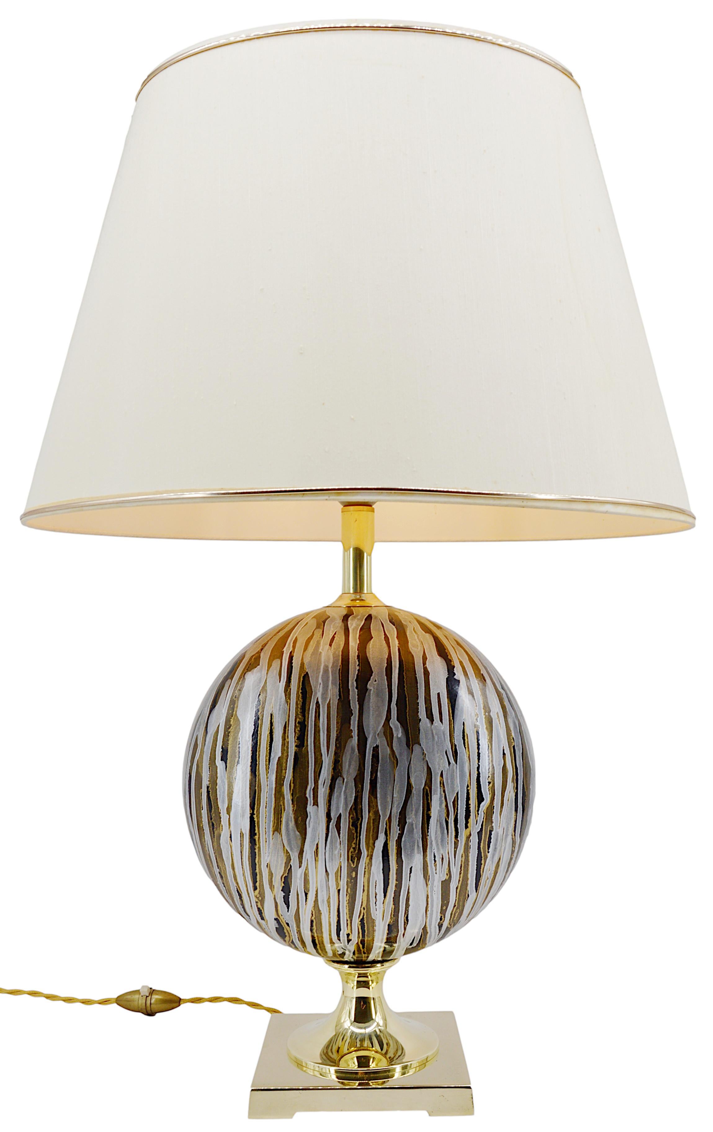 French table lamp by Maison Drimmer, France, 1980s. Ceramic and brass. The lampshade is not provided. So you can choose the one that suits your interior. Height from the base of the lamp to the top of the socket : 18.5