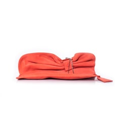 Maison Du Posh, coral pink clutch with skulls