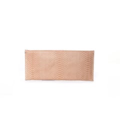 Maison Du Posh, Knuckle ring clutch in beige python.