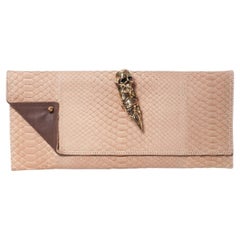 Maison Du Posh, Knuckle ring clutch in beige python.
