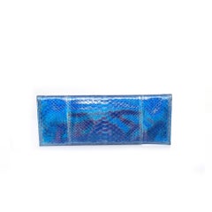 Maison Du Posh, Knuckle ring clutch in metallic-coated snakeskin.