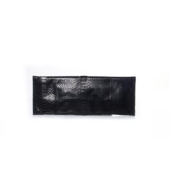 Maison Du Posh, Knuckle ring python clutch in black.